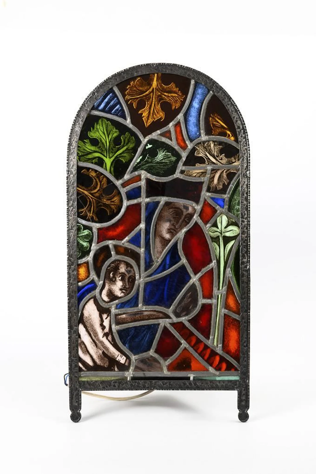 Wall lamp with leaded glass panel.