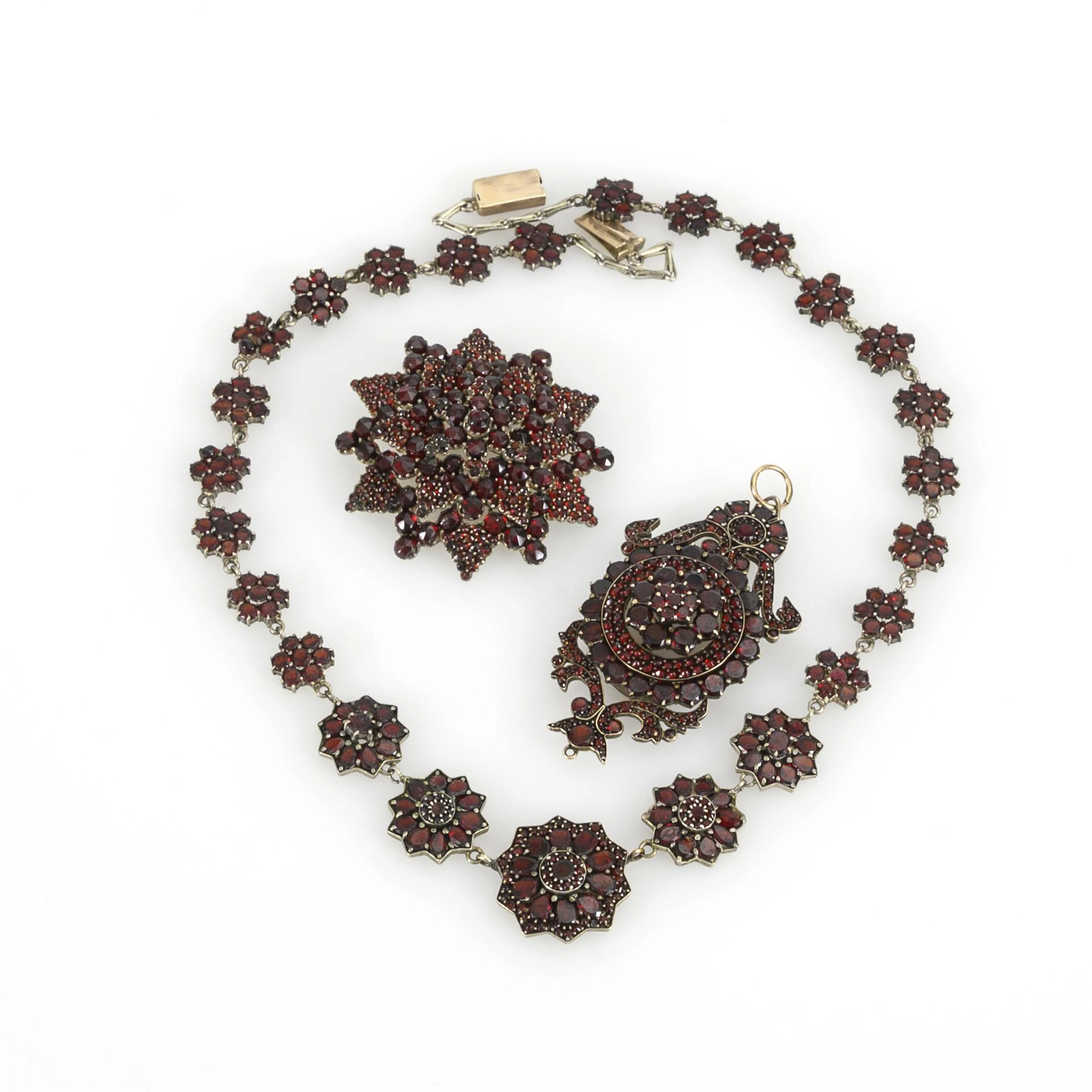 3 pieces of historical garnet jewelry.