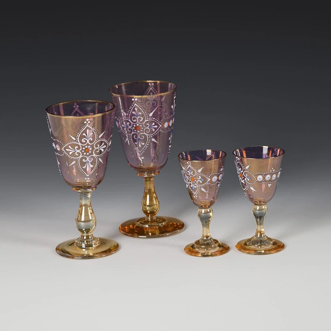 2 wine glasses and 2 liqueur glasses with gold irises. Annín Glassworks
