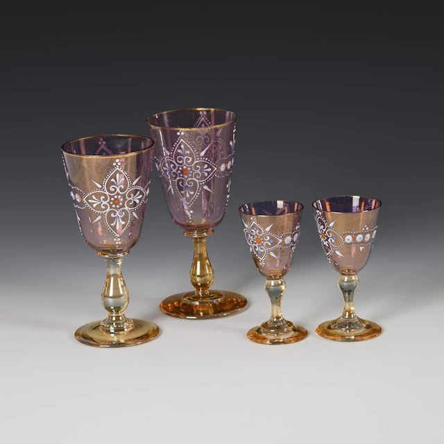 2 wine glasses and 2 liqueur glasses with gold irises. Annín Glassworks