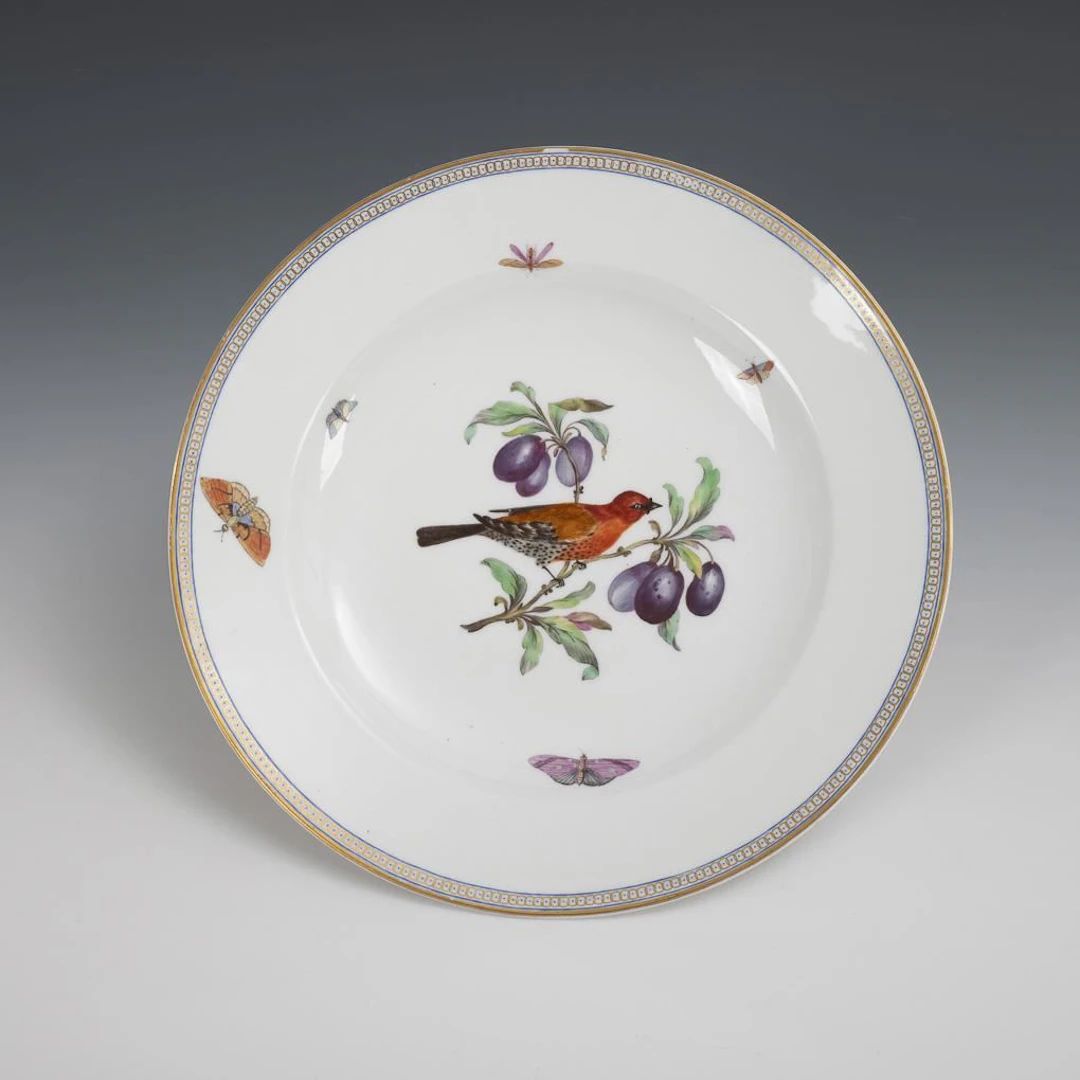 Empire-style plate with bird and insect motifs. KPM Berlin.