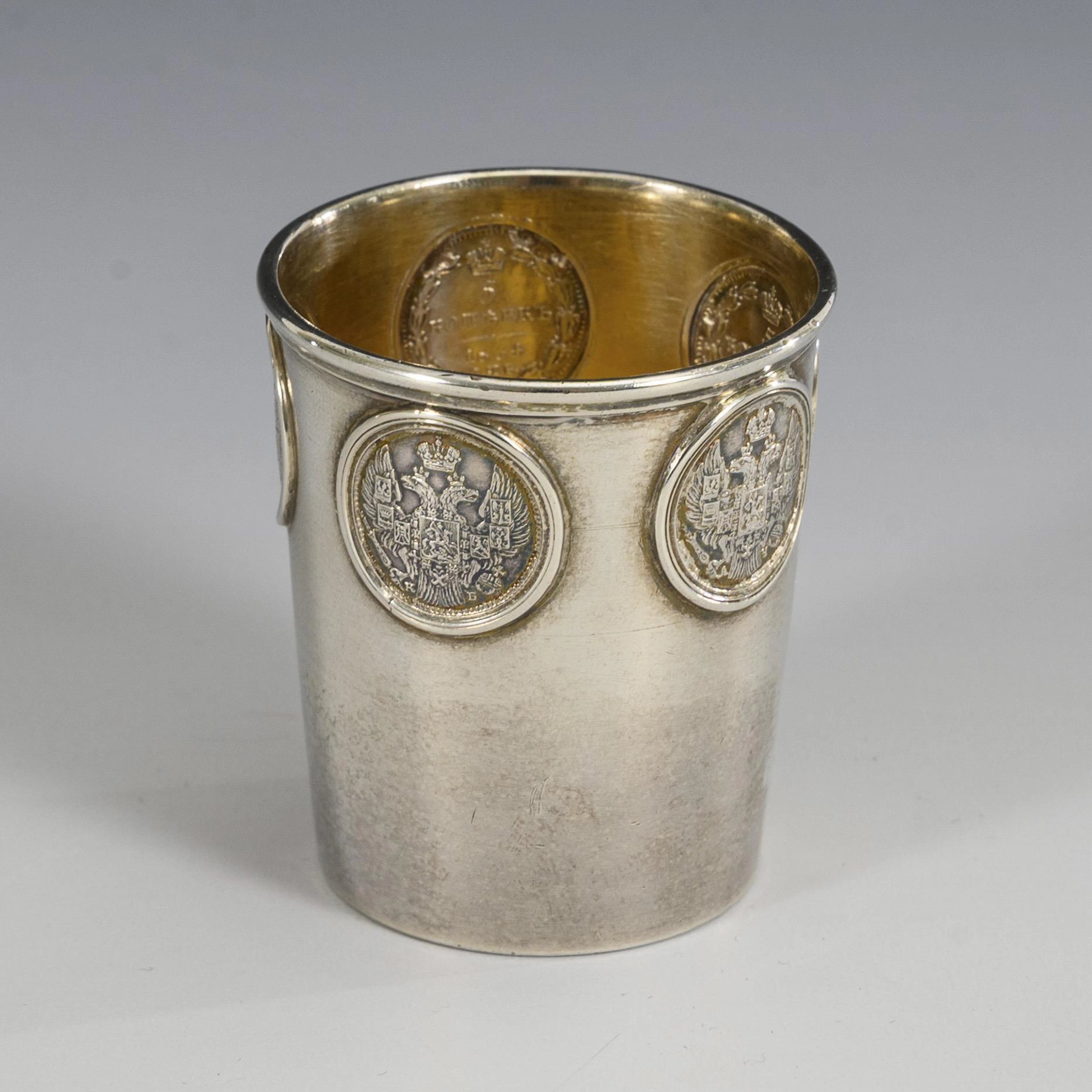 Small Russian coin cup.