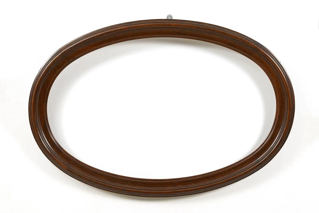 Oval solid wood frame.
