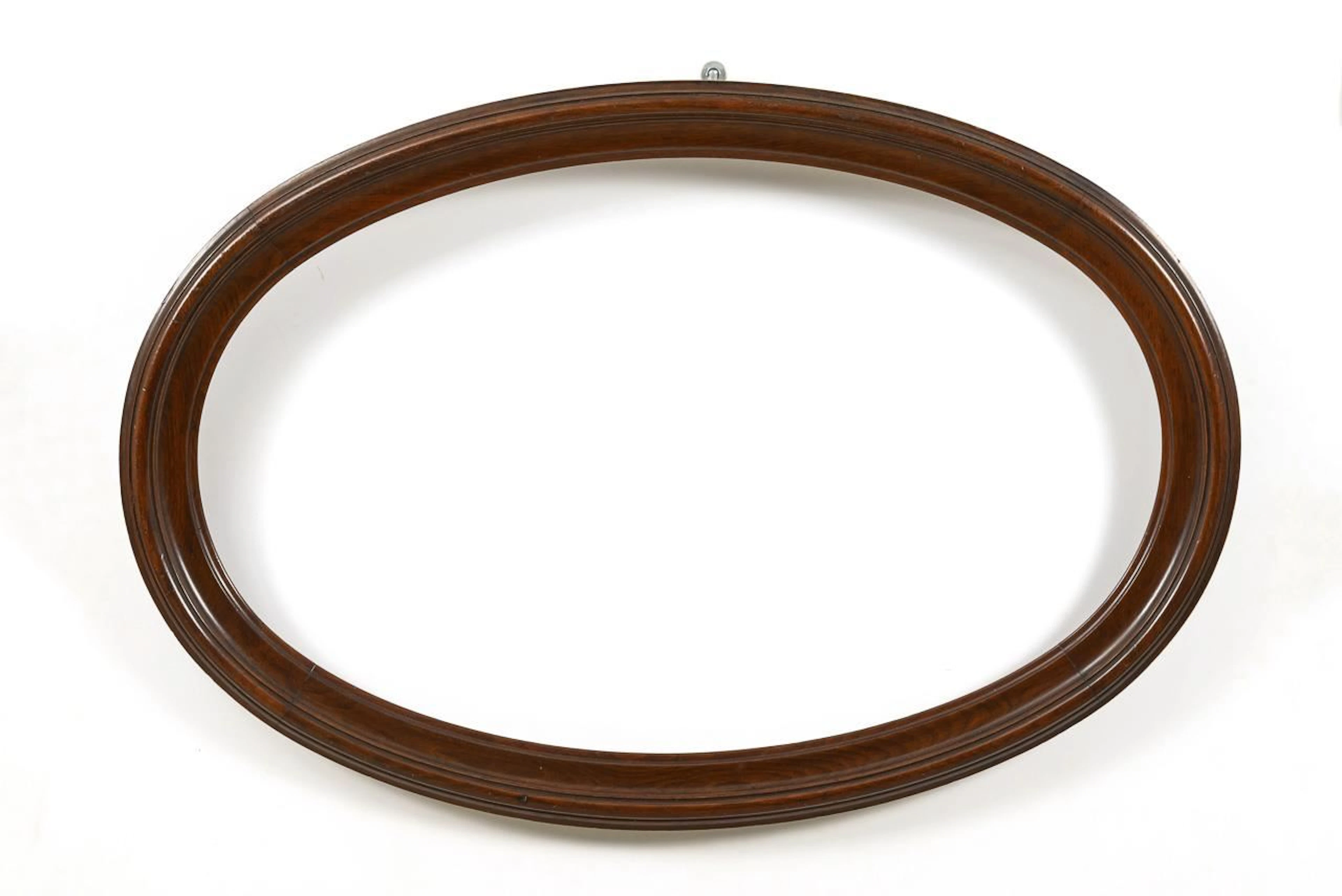 Oval solid wood frame.