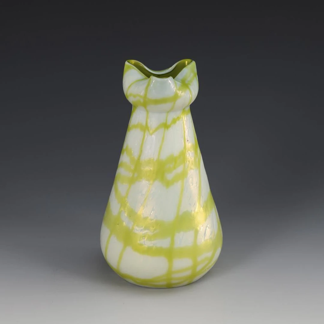 Rare Art Nouveau vase with a green thread-like mesh. Kralik.