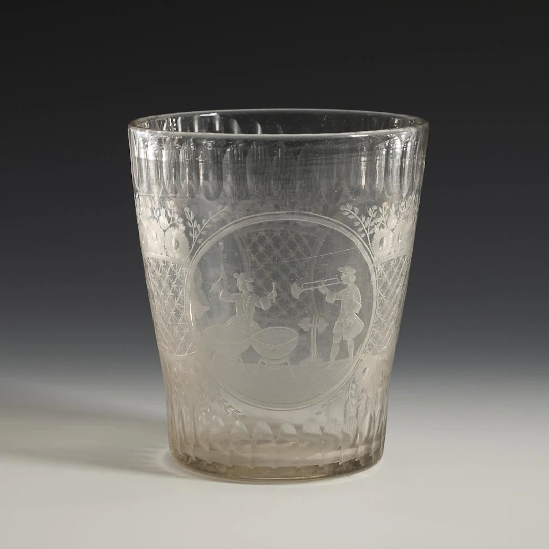 Large Baroque goblet with musical motifs.