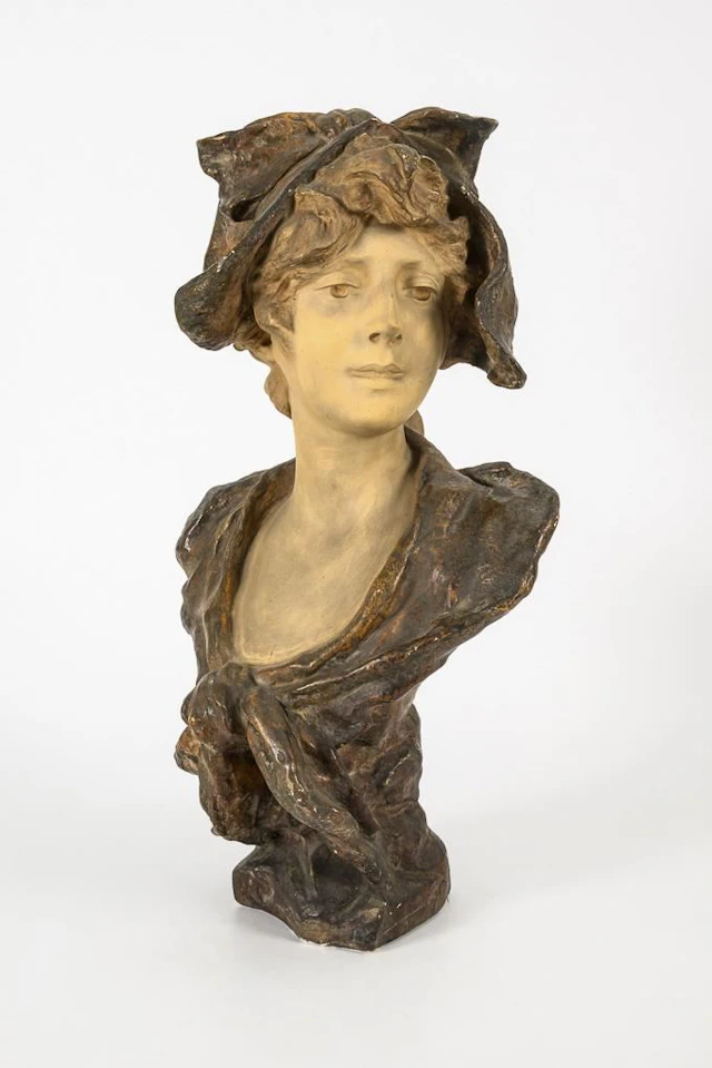 Bust of a young woman.