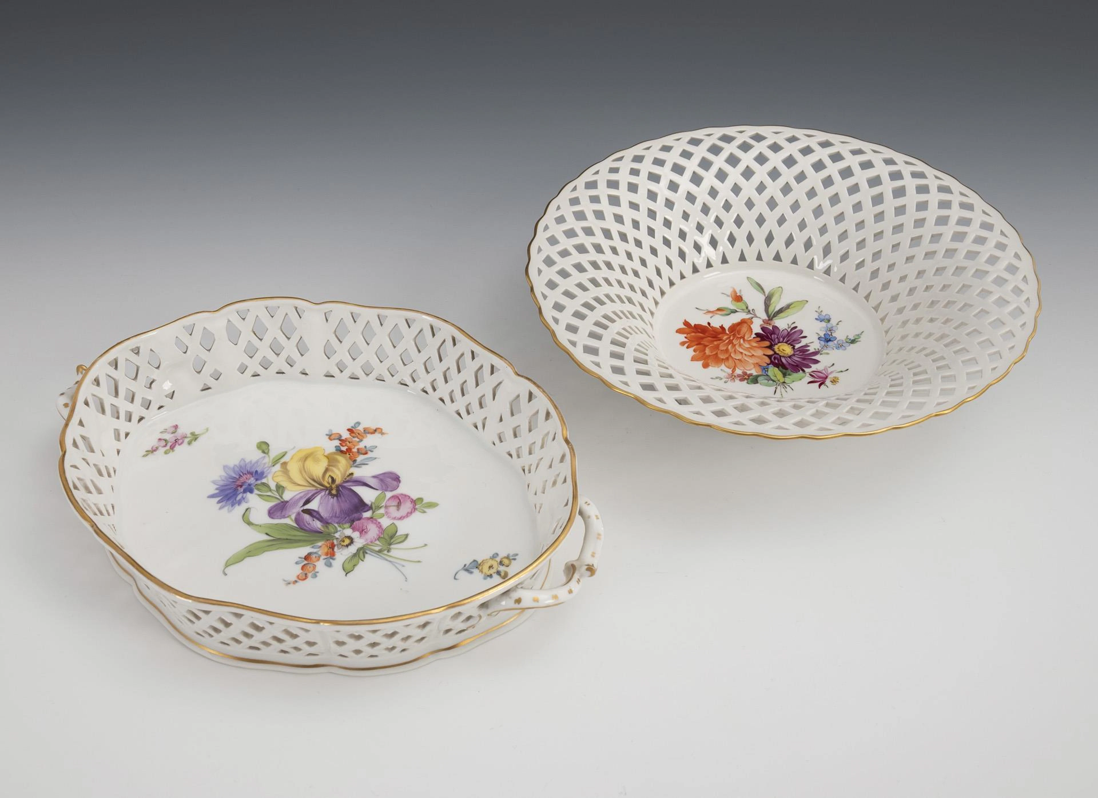 2 different perforated baskets with flower painting.