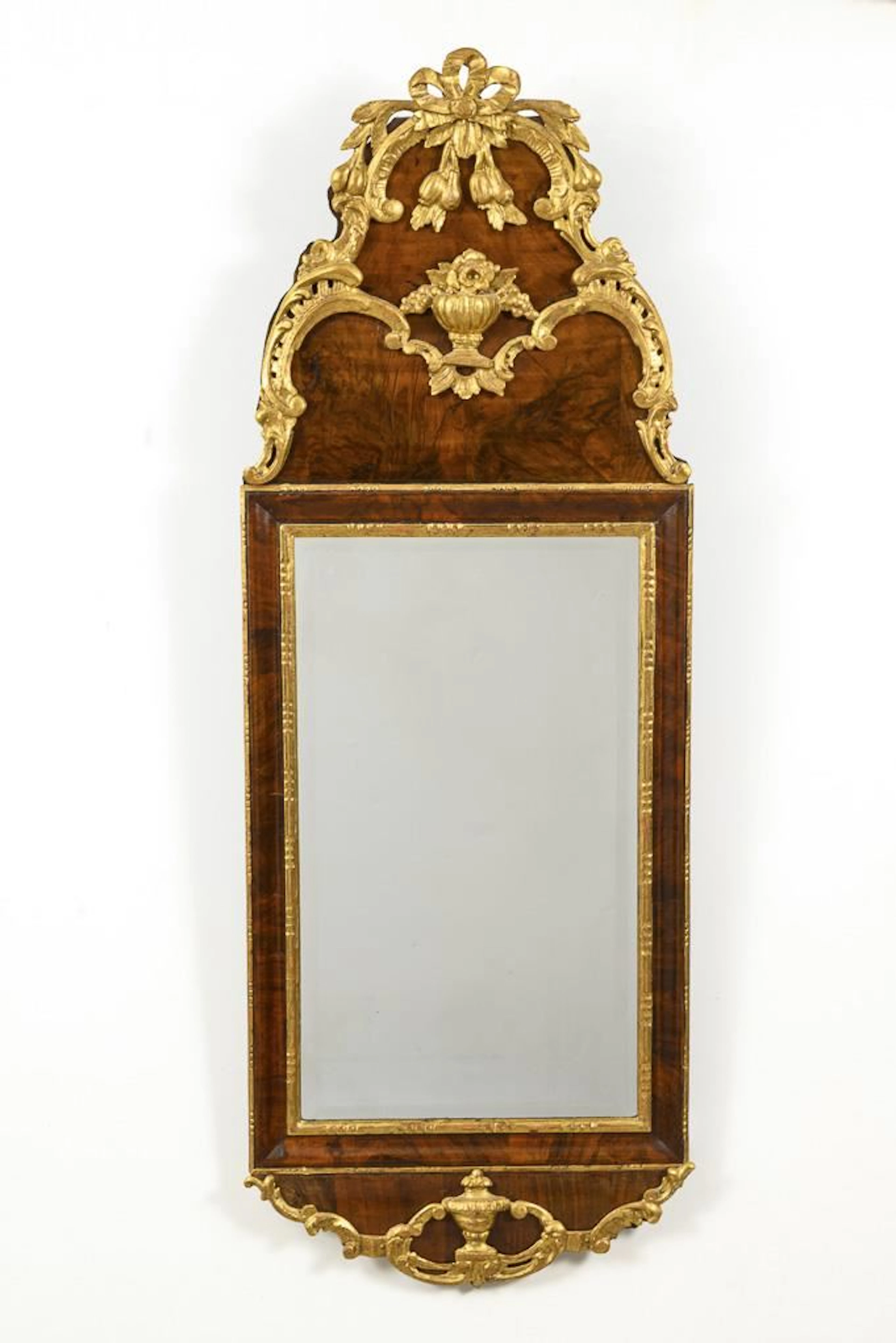 Richly Decorated Mahogany Mirror.