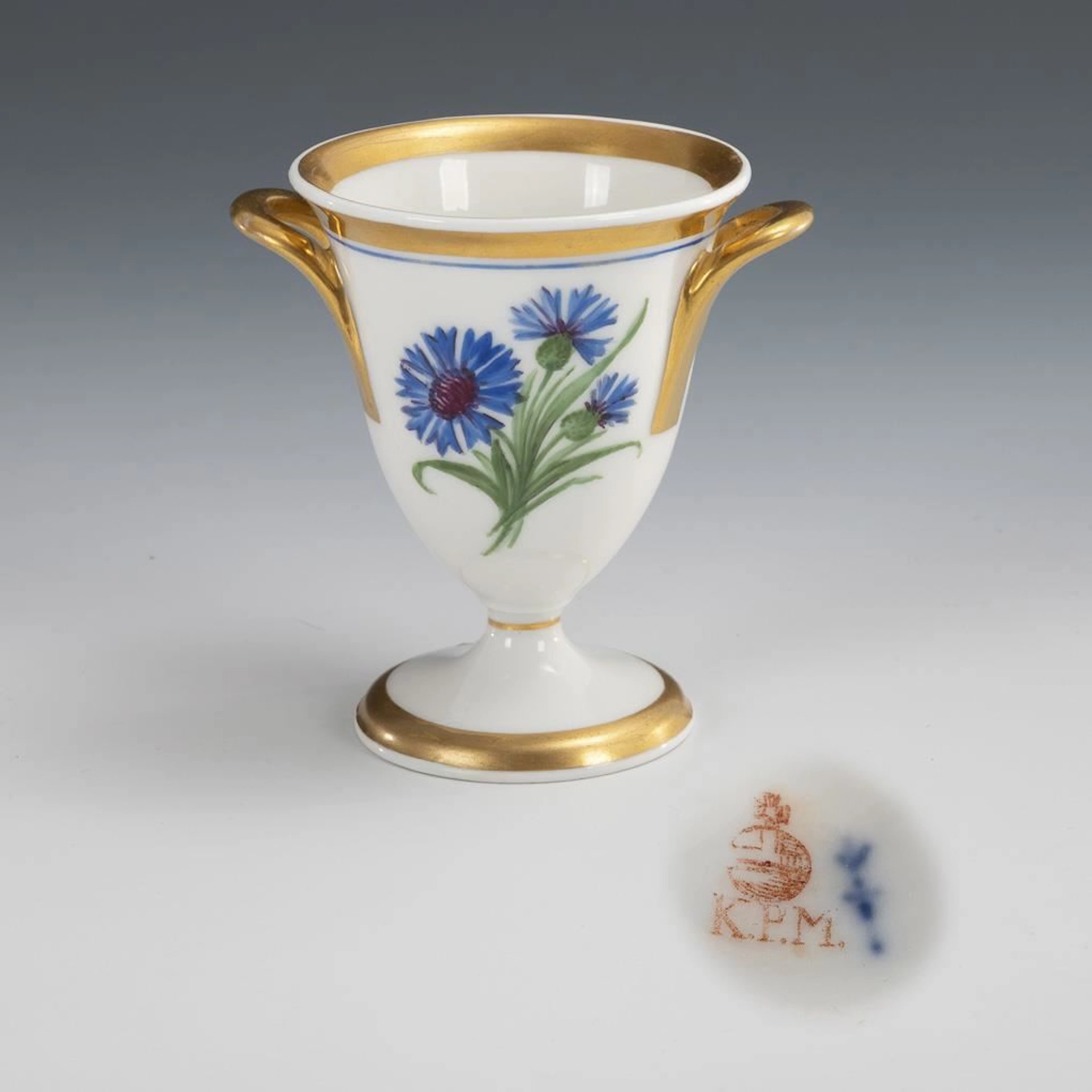 Yellow cup with cornflowers and morning glories. KPM Berlin.