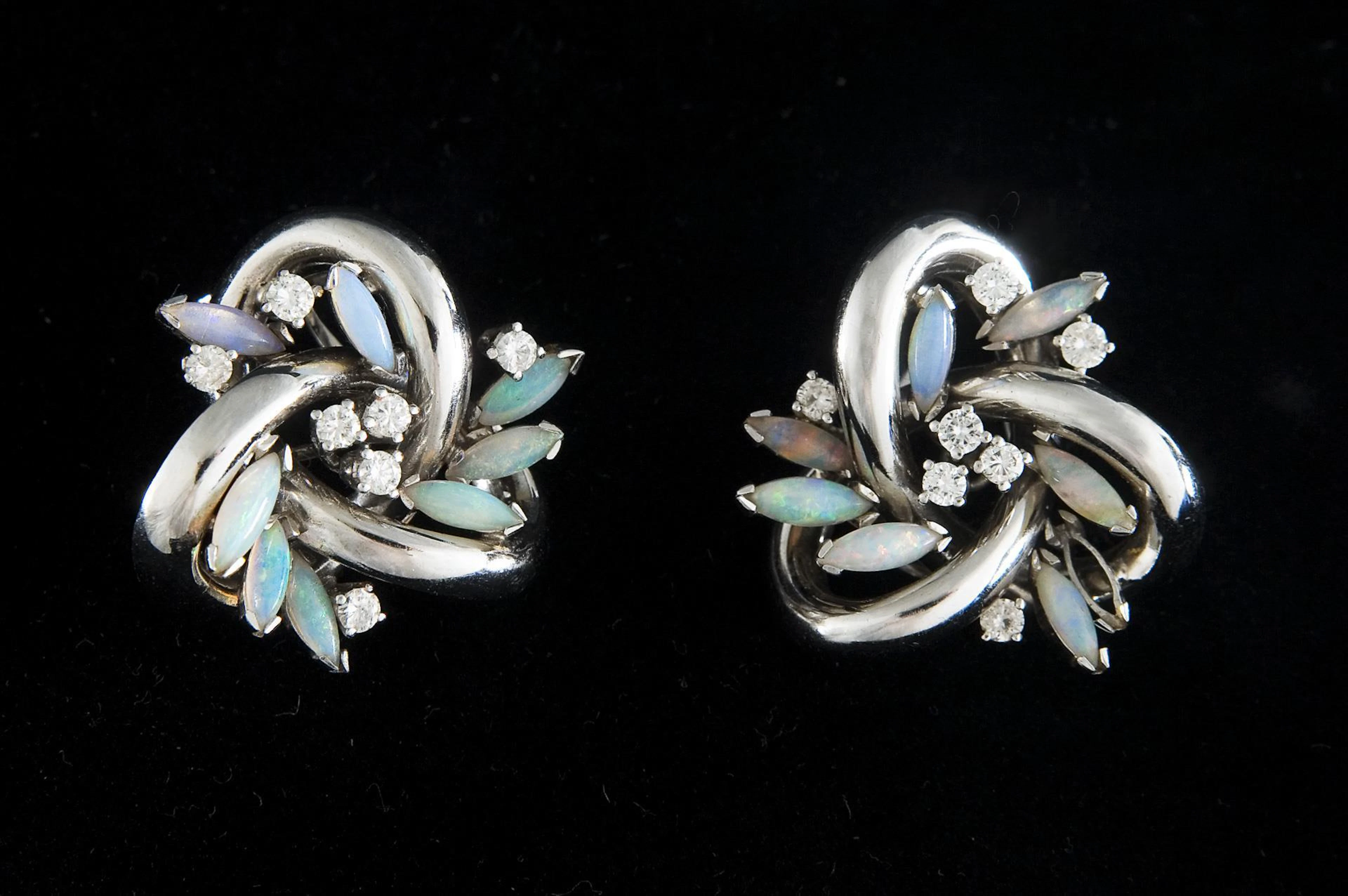 Pair of opal diamond ear clips.