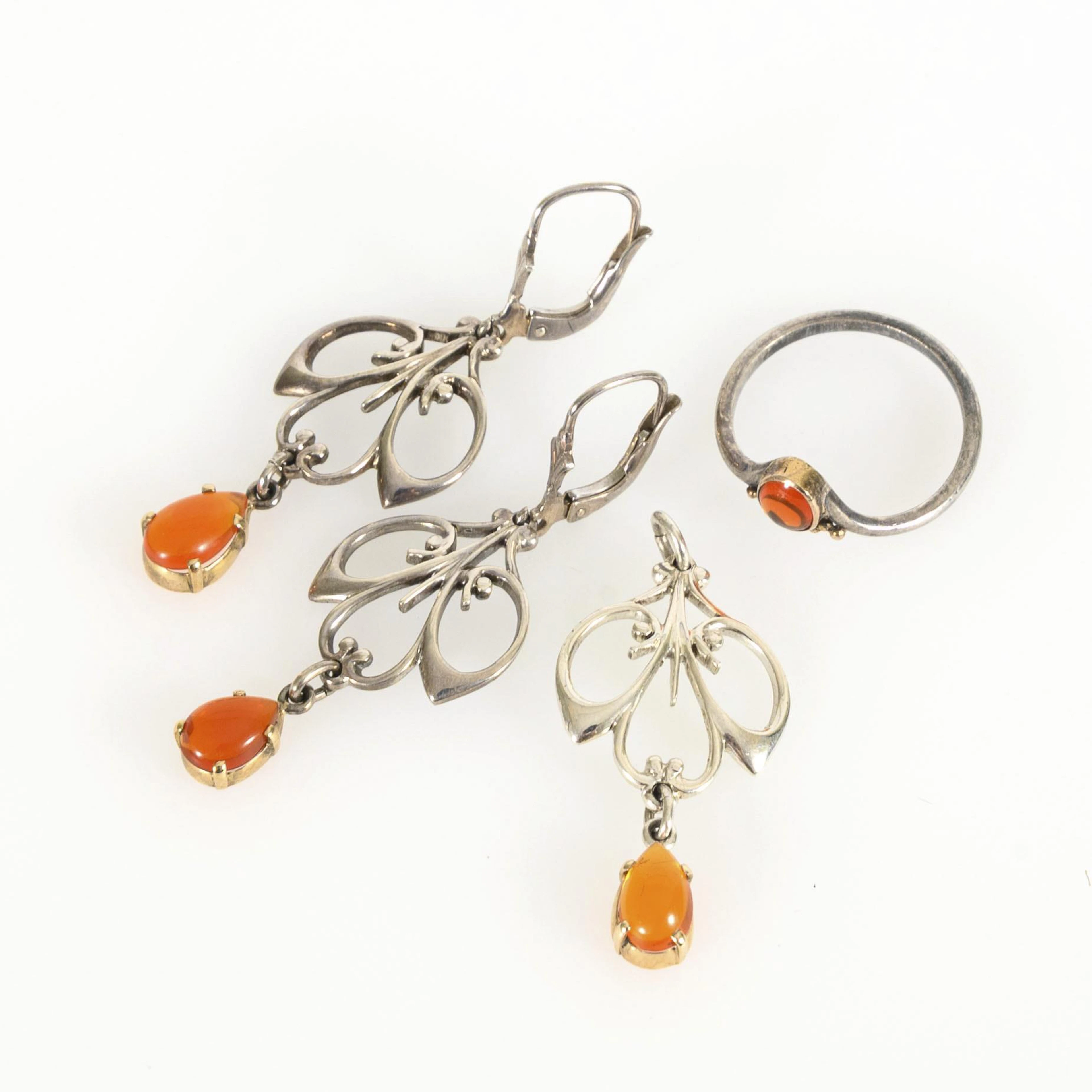 Silver jewelry set with fire opals.