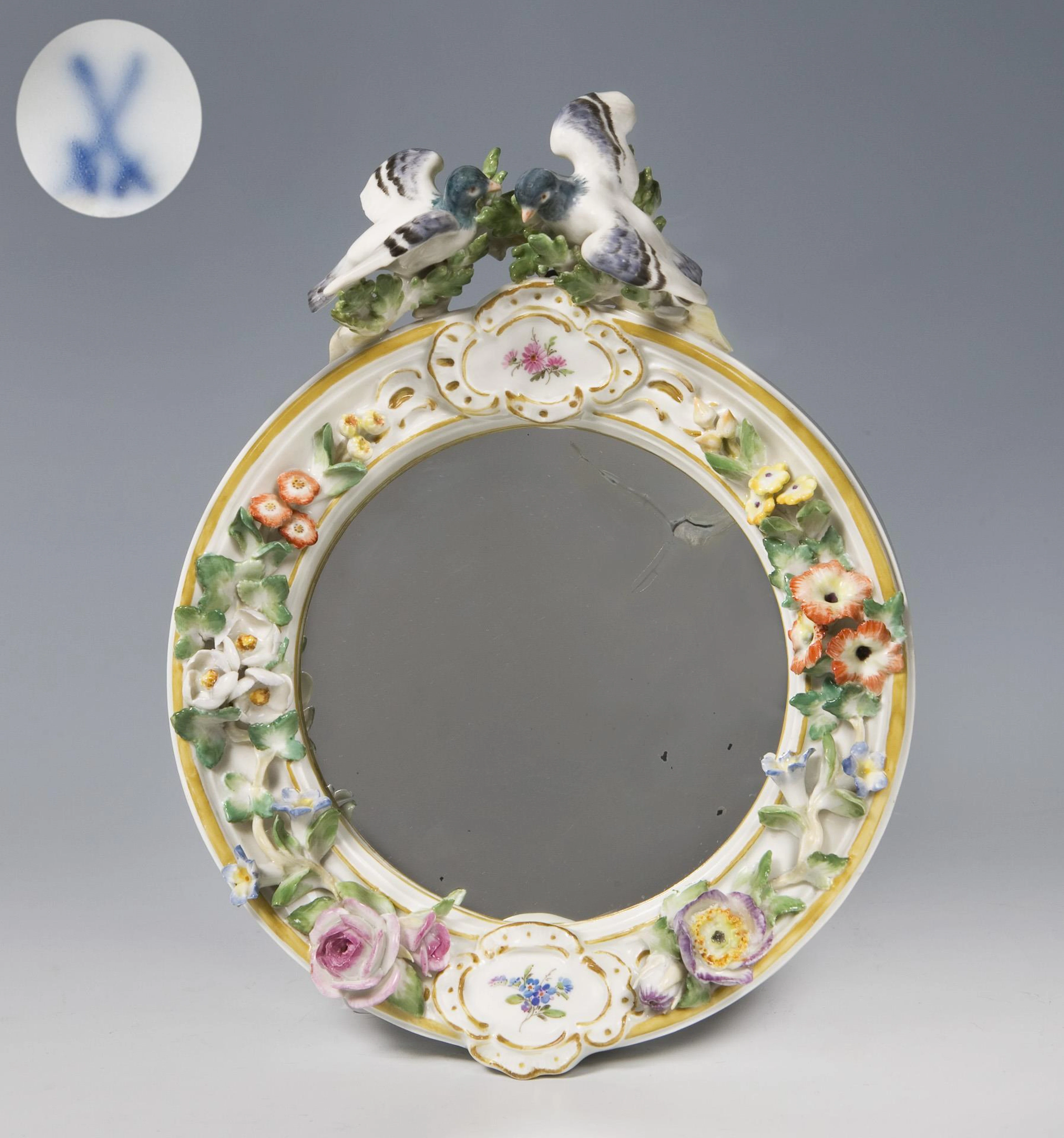Rare wall mirror with floral decoration and turtle doves. Meissen.