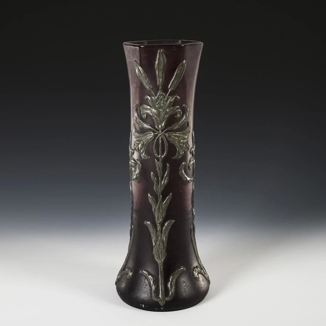 Large Art Nouveau vase with pewter overlay.