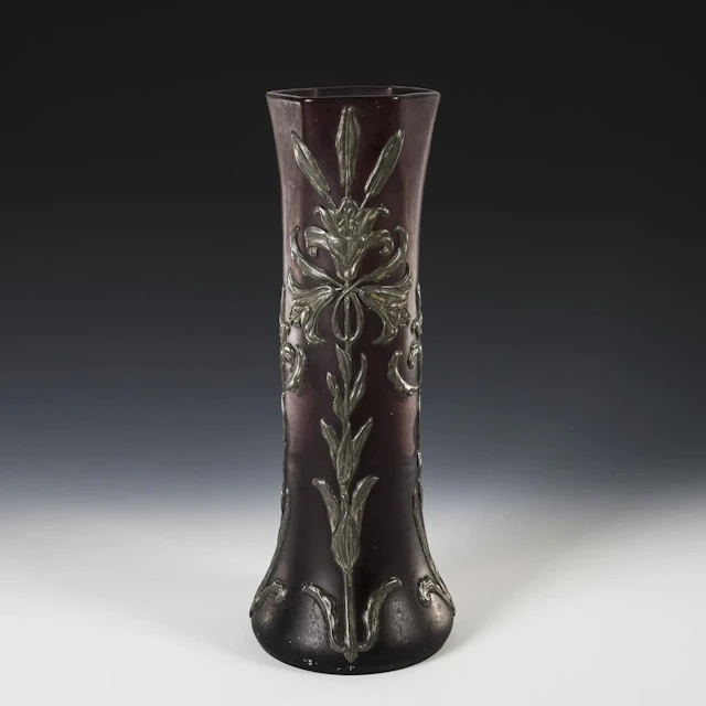 Large Art Nouveau vase with pewter overlay.