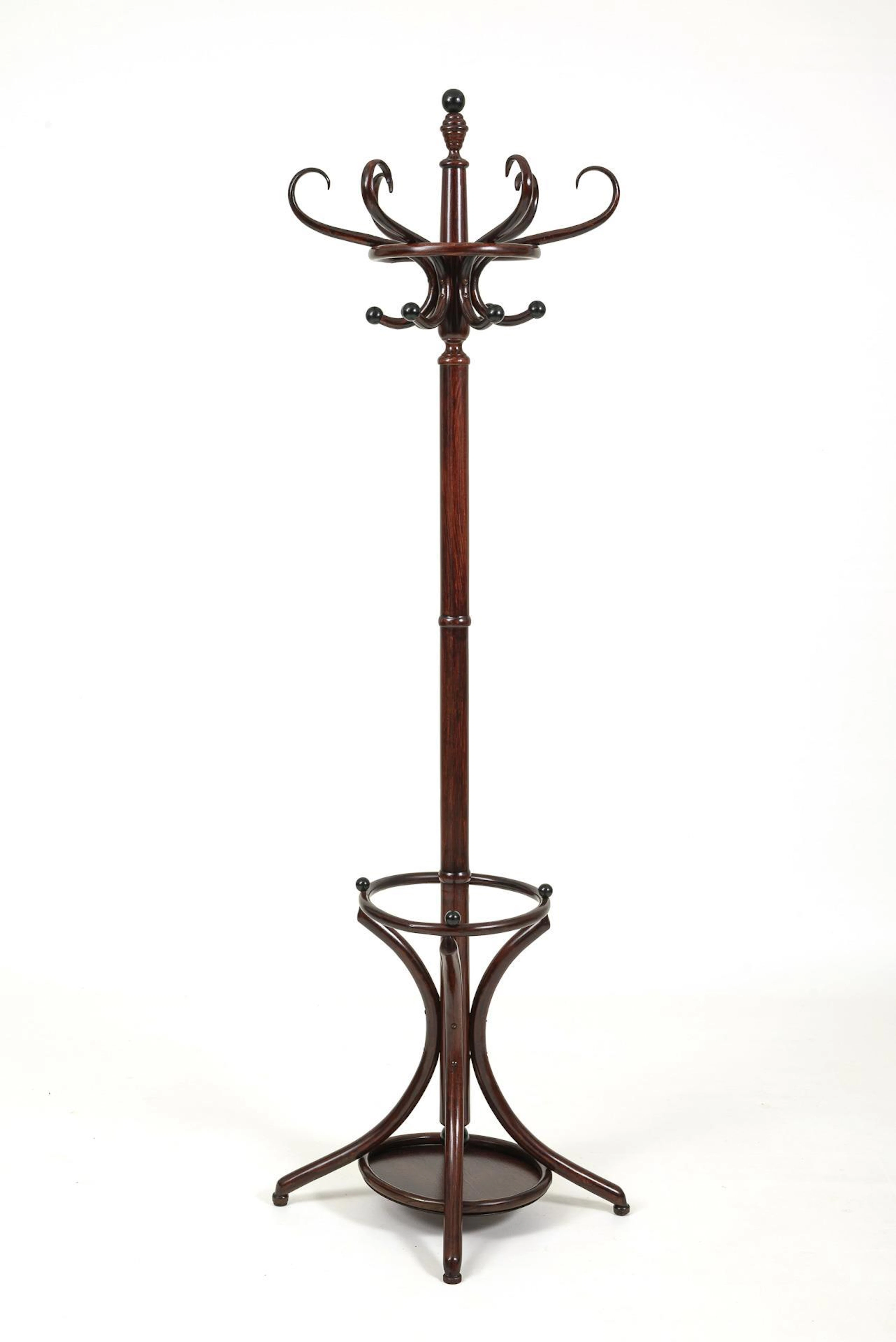 Bentwood clothes rack with umbrella holder.