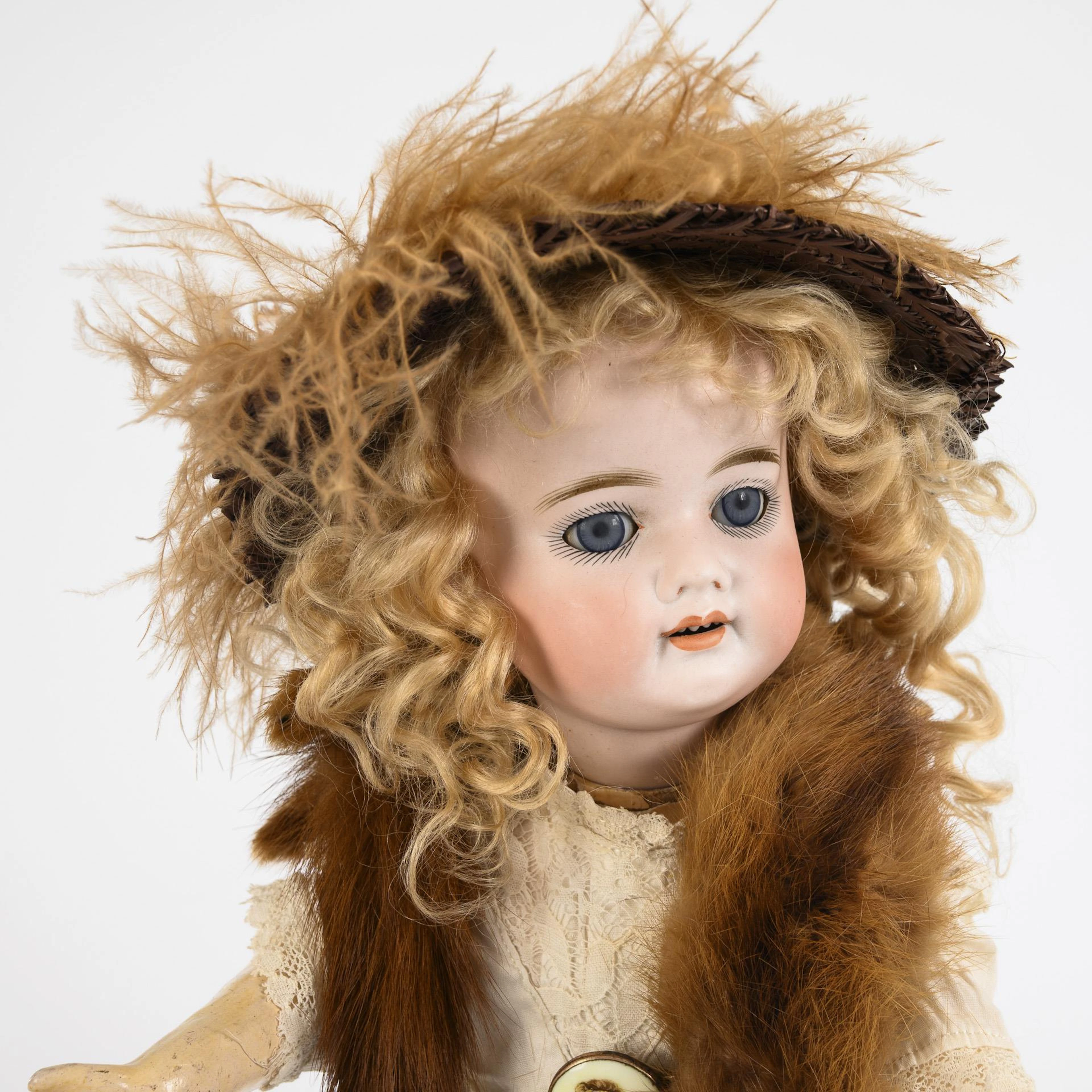 Dainty doll lady with fur necklace and hat. Schoenau & Hoffmeister.