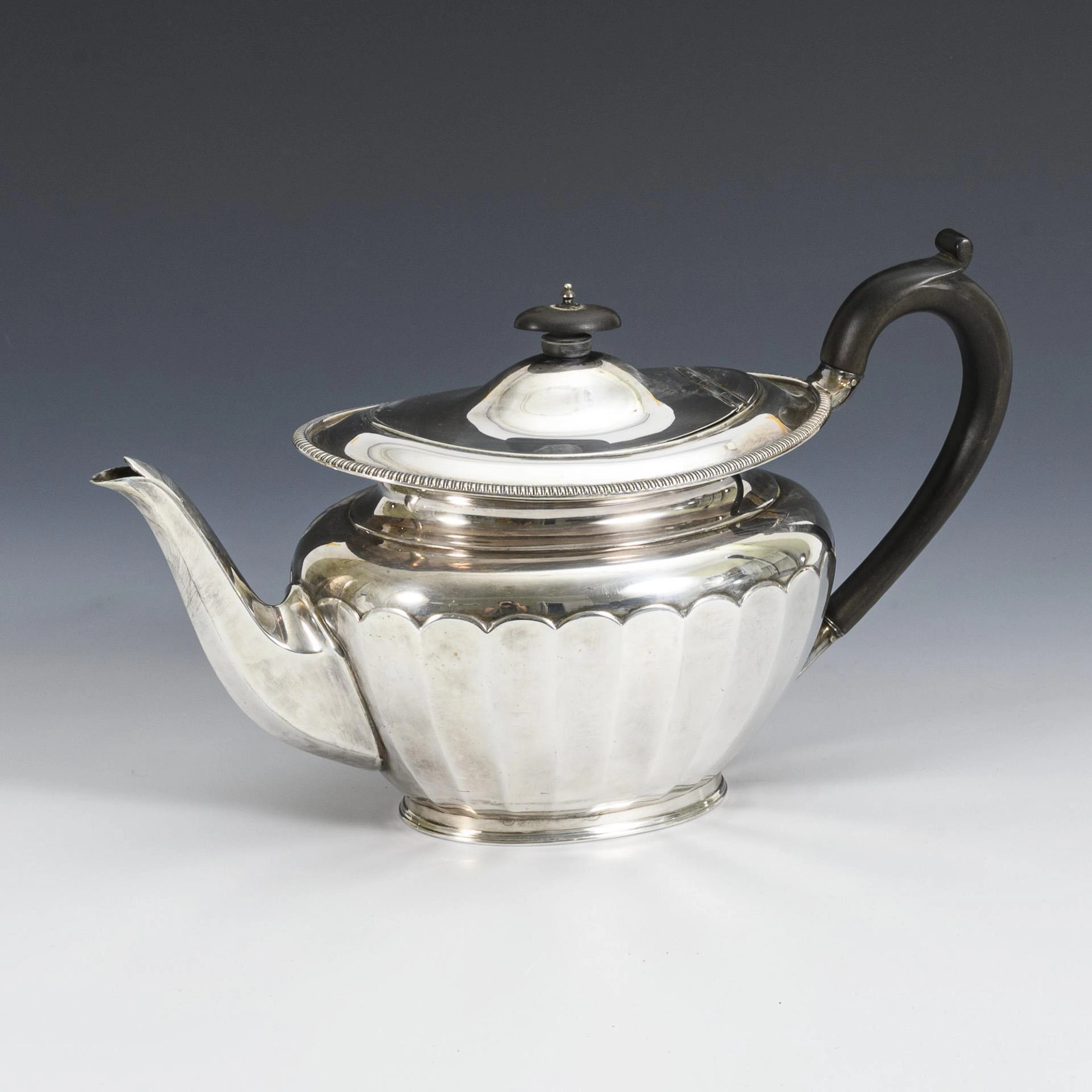Silver-plated teapot.