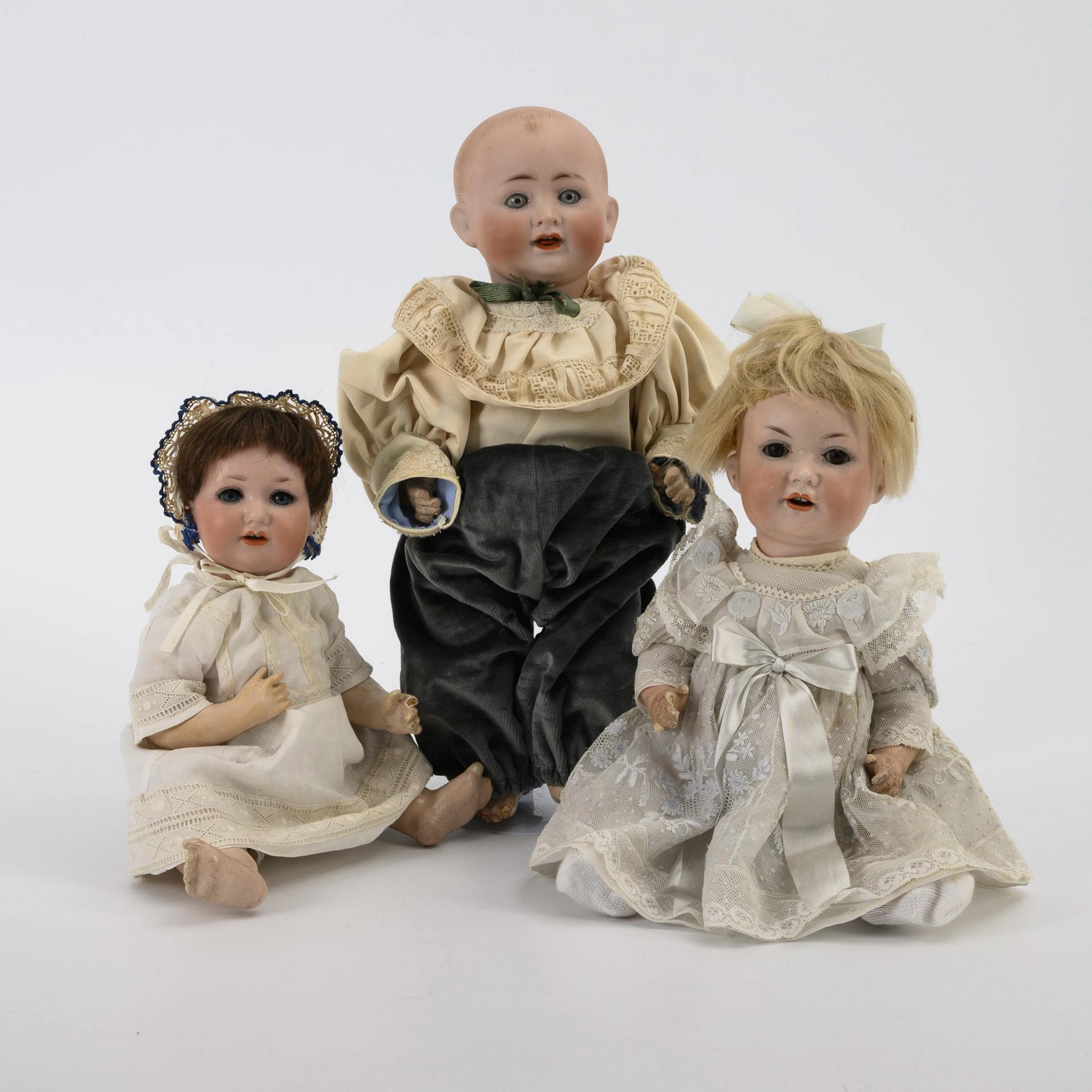 3 character dolls.