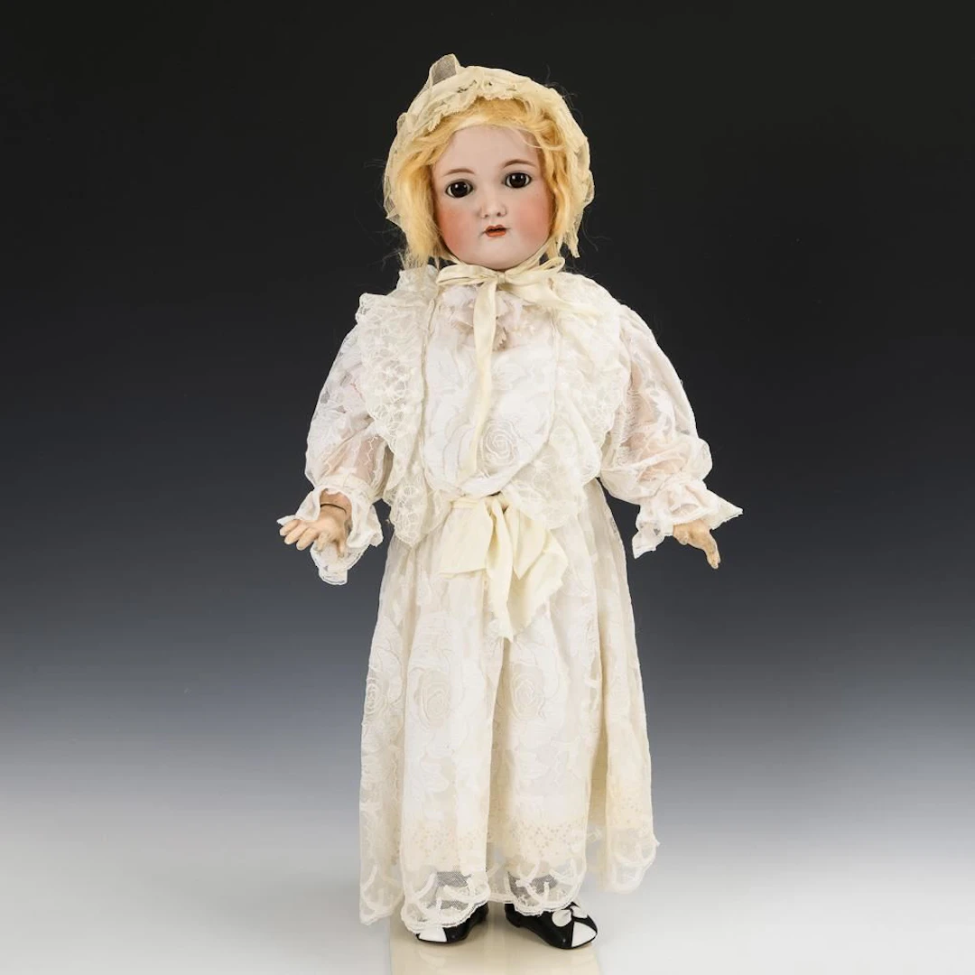 Blonde doll girl in a white dress. Kämmer & Reinhardt.