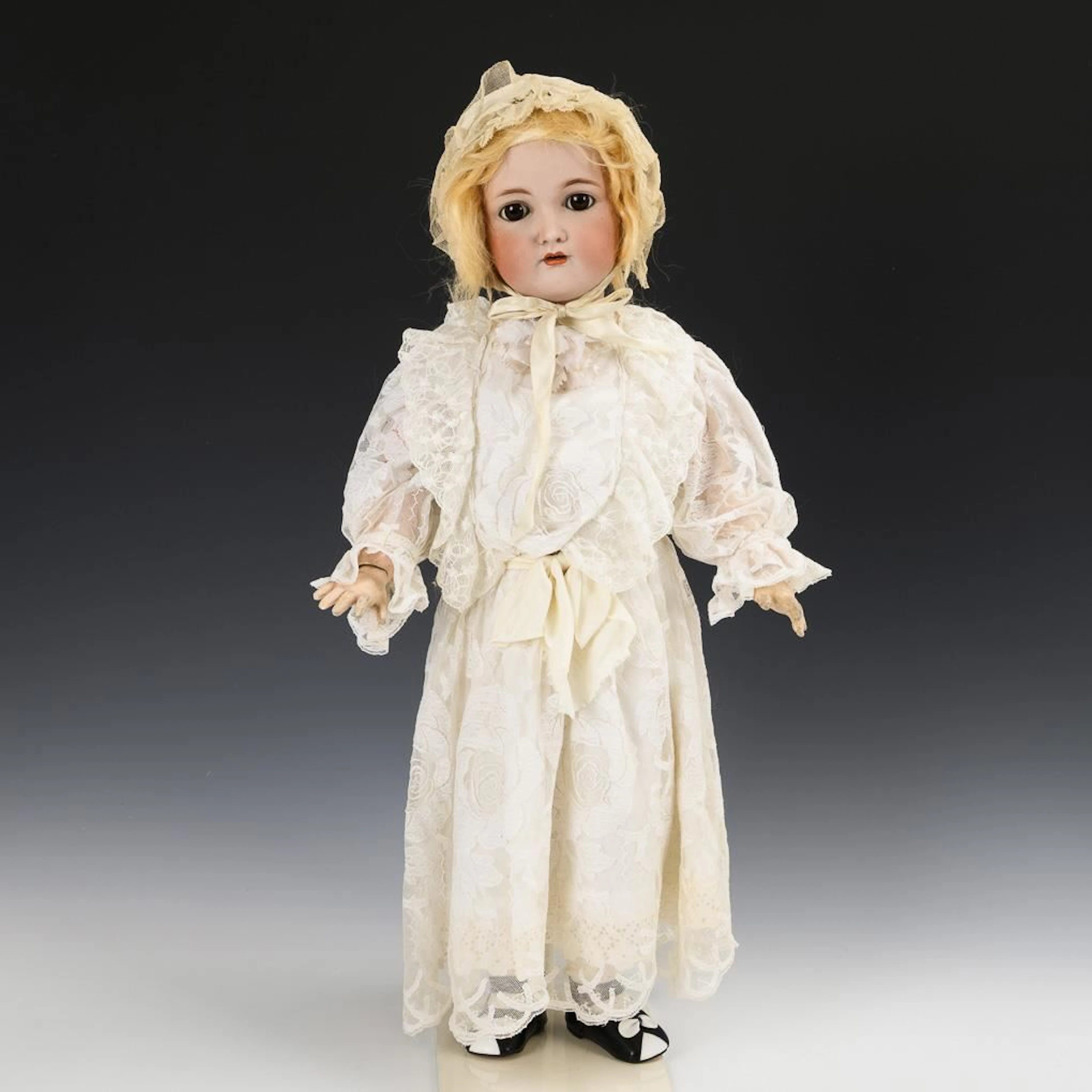 Blonde doll girl in a white dress. Kämmer & Reinhardt.