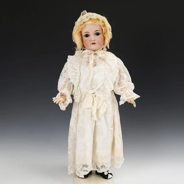 Blonde doll girl in a white dress. Kämmer & Reinhardt.