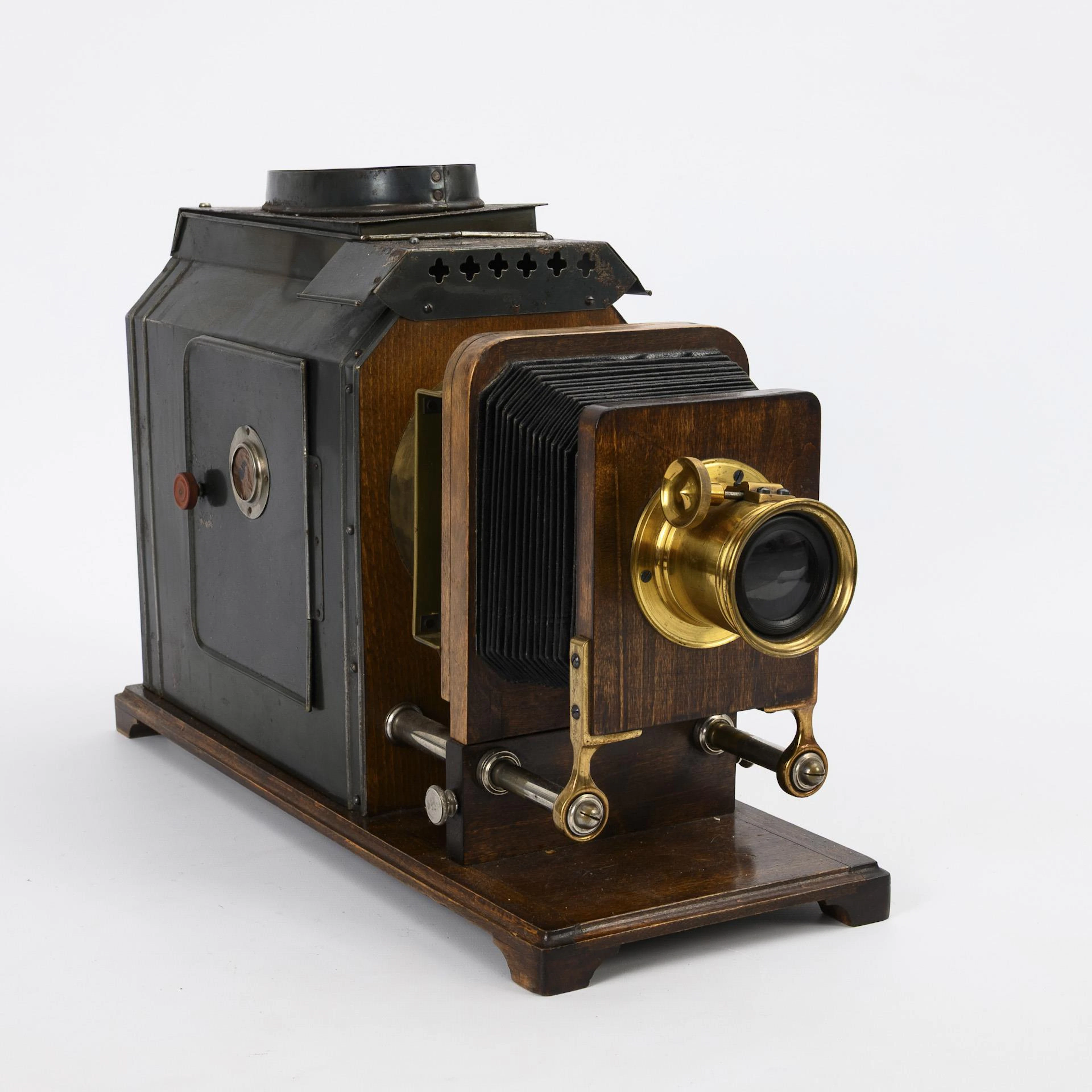 Early slide projector with gas operation.