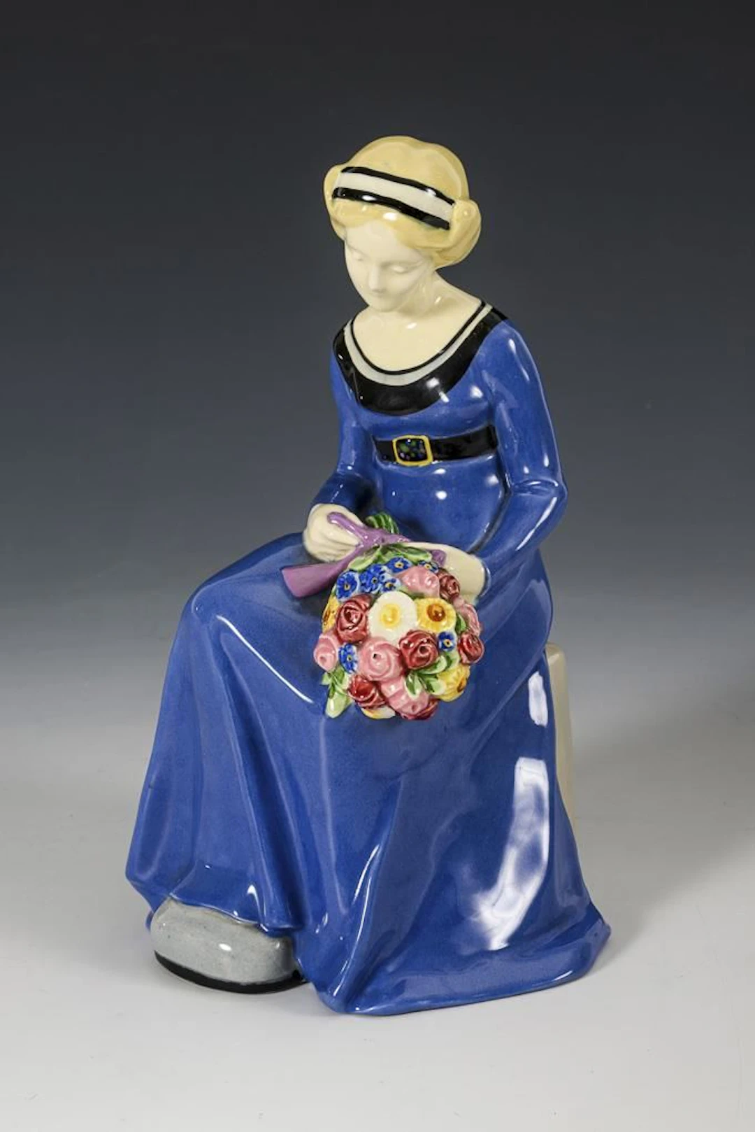Seated Young Woman with a Bouquet of Flowers. Vienna Art Ceramics