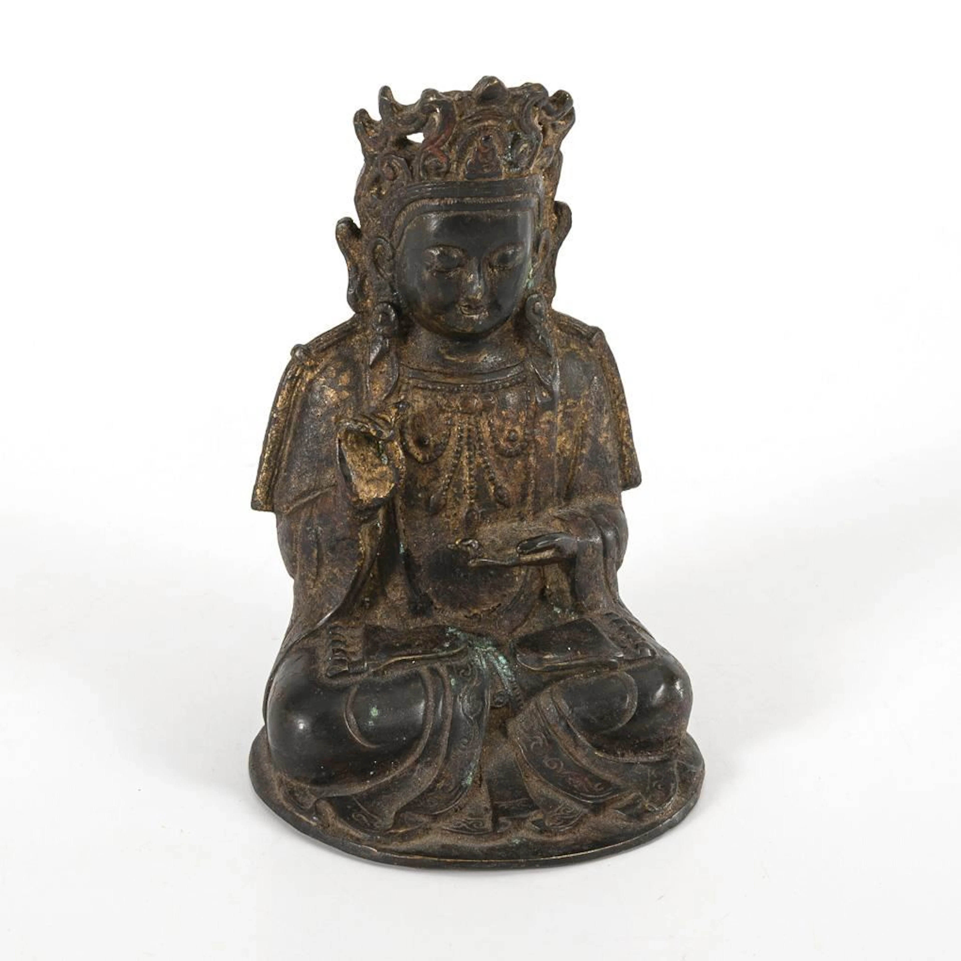 Guanjin in the cross-legged position.