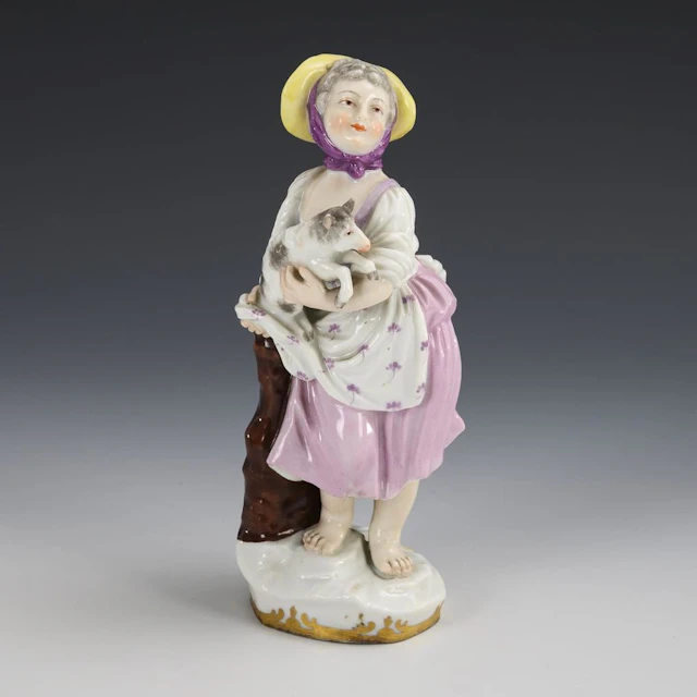 Shepherdess with Lamb.