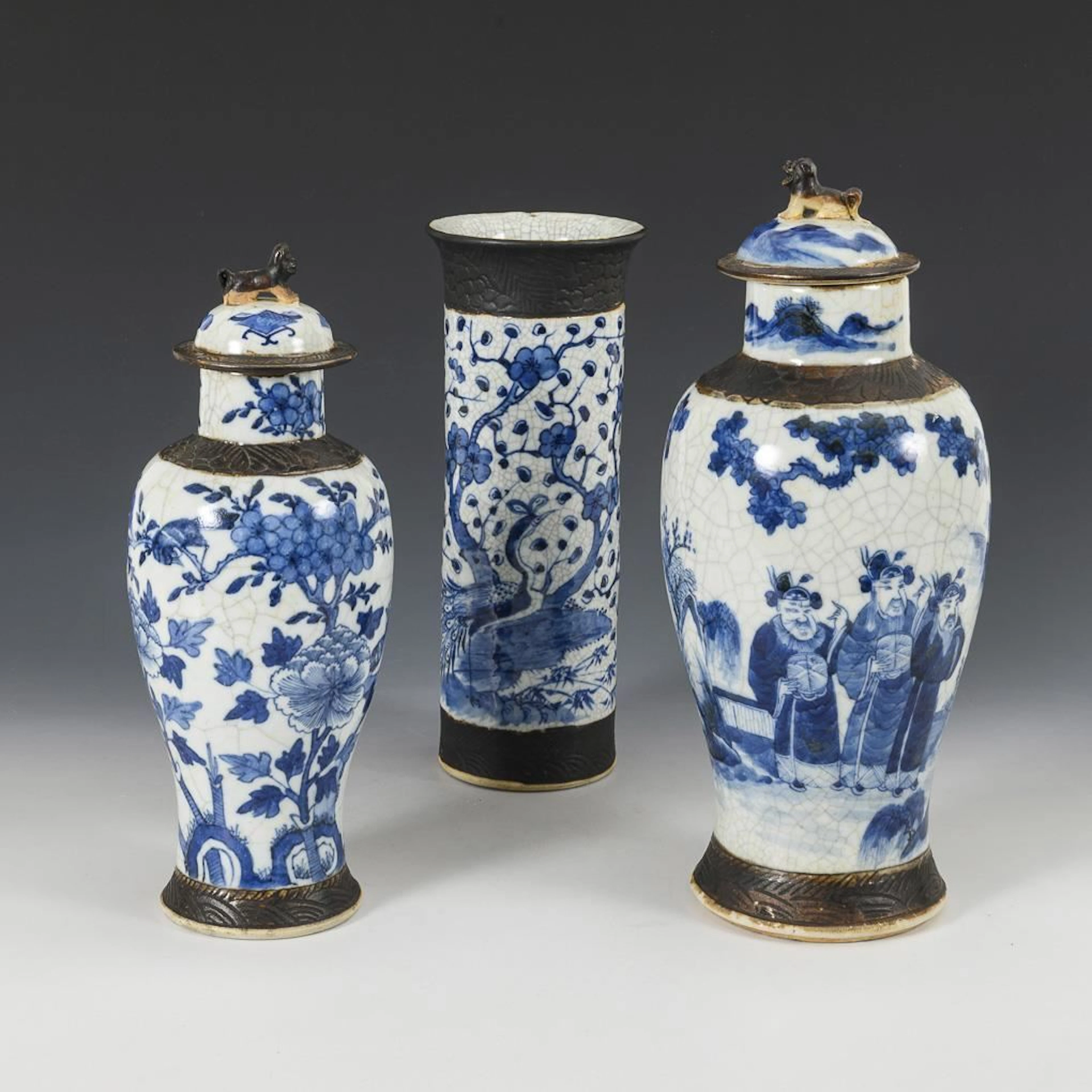 3 Asian vases with blue underglaze painting and crackle glaze.