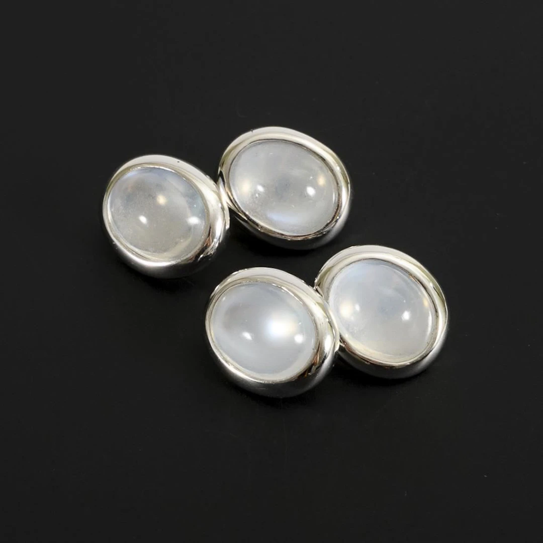 Cufflinks with moonstones.