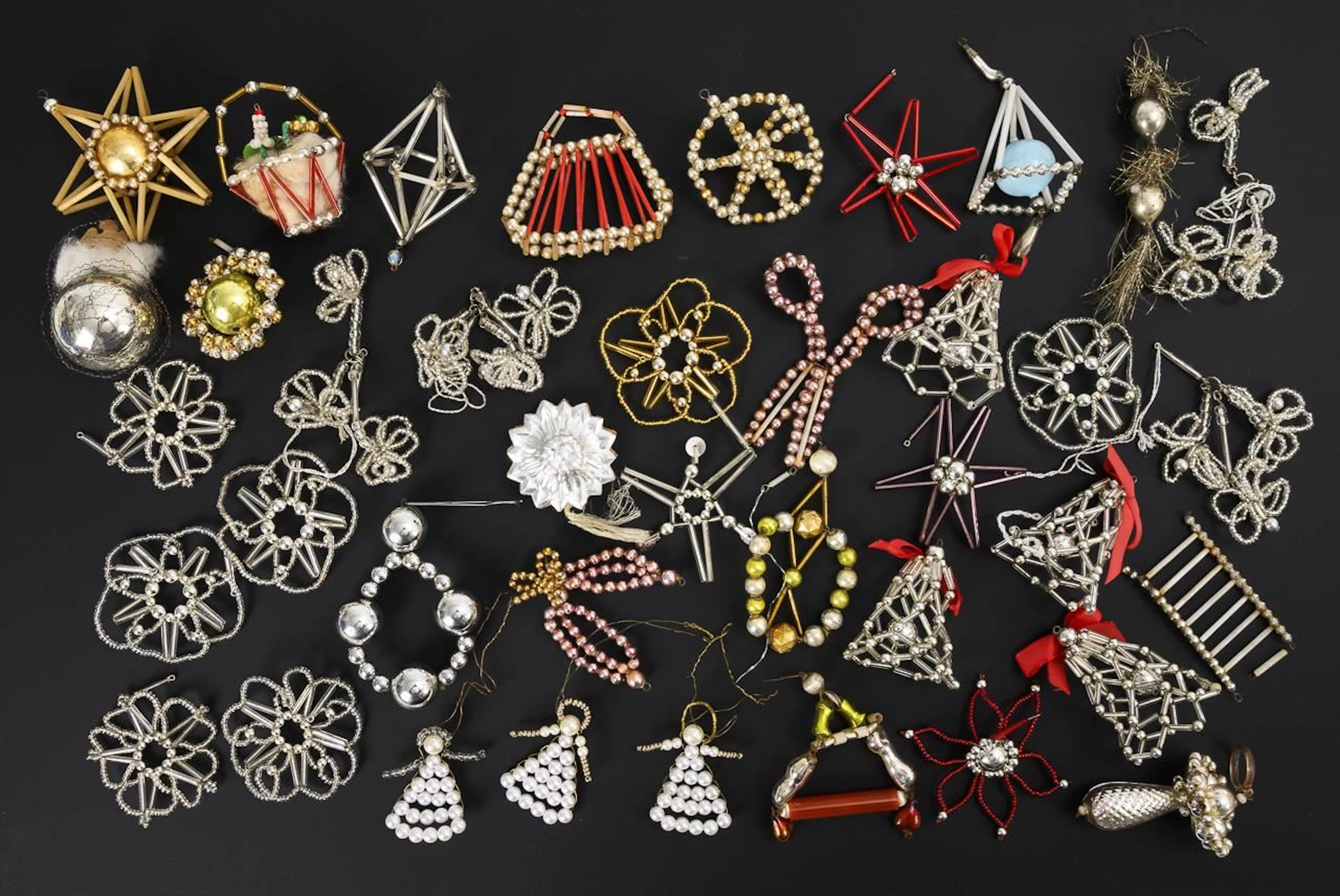 Assortment of Gablonz Christmas tree ornaments.