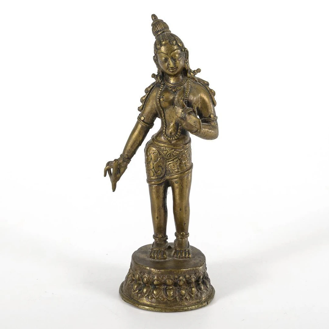 Small, standing Sarasvati—goddess of wisdom.