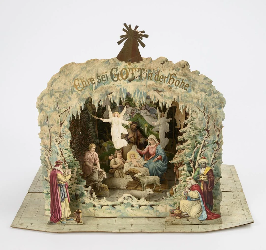 Large fold-out paper nativity scene with a pyramid wheel. Excelsior