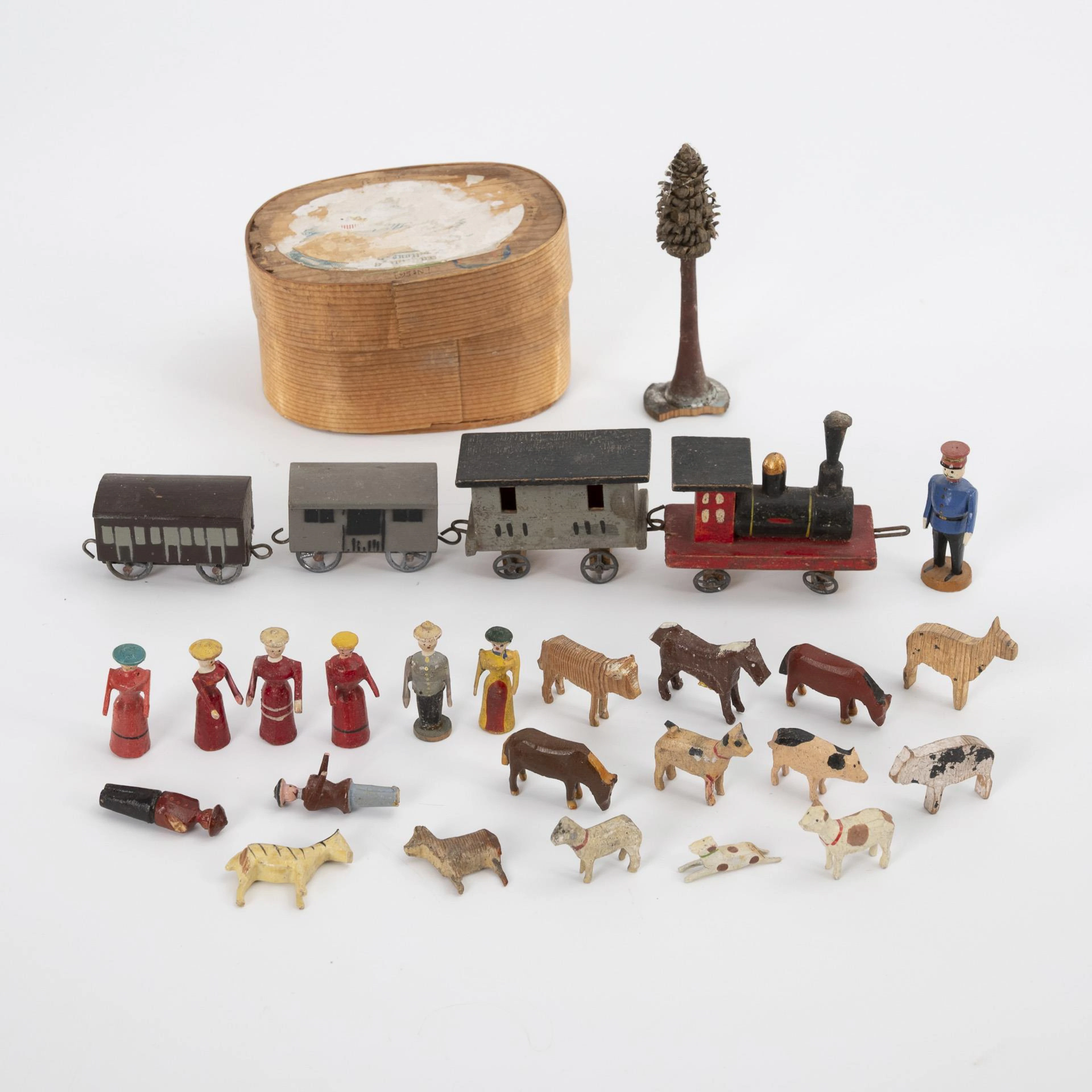 Miniature wooden train, plus small chipboard box with figures. Erzgebirge.