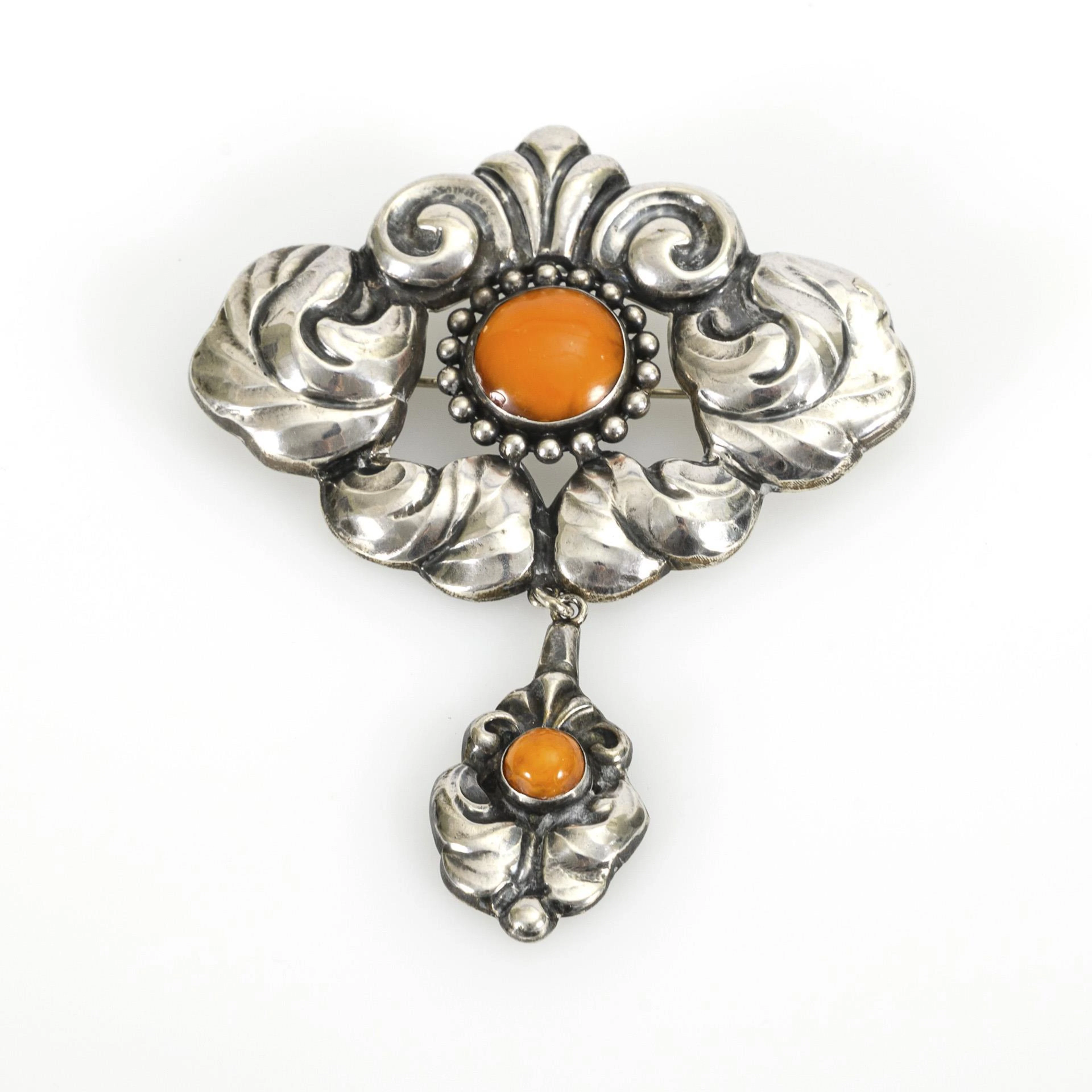 Danish silver brooch with amber.