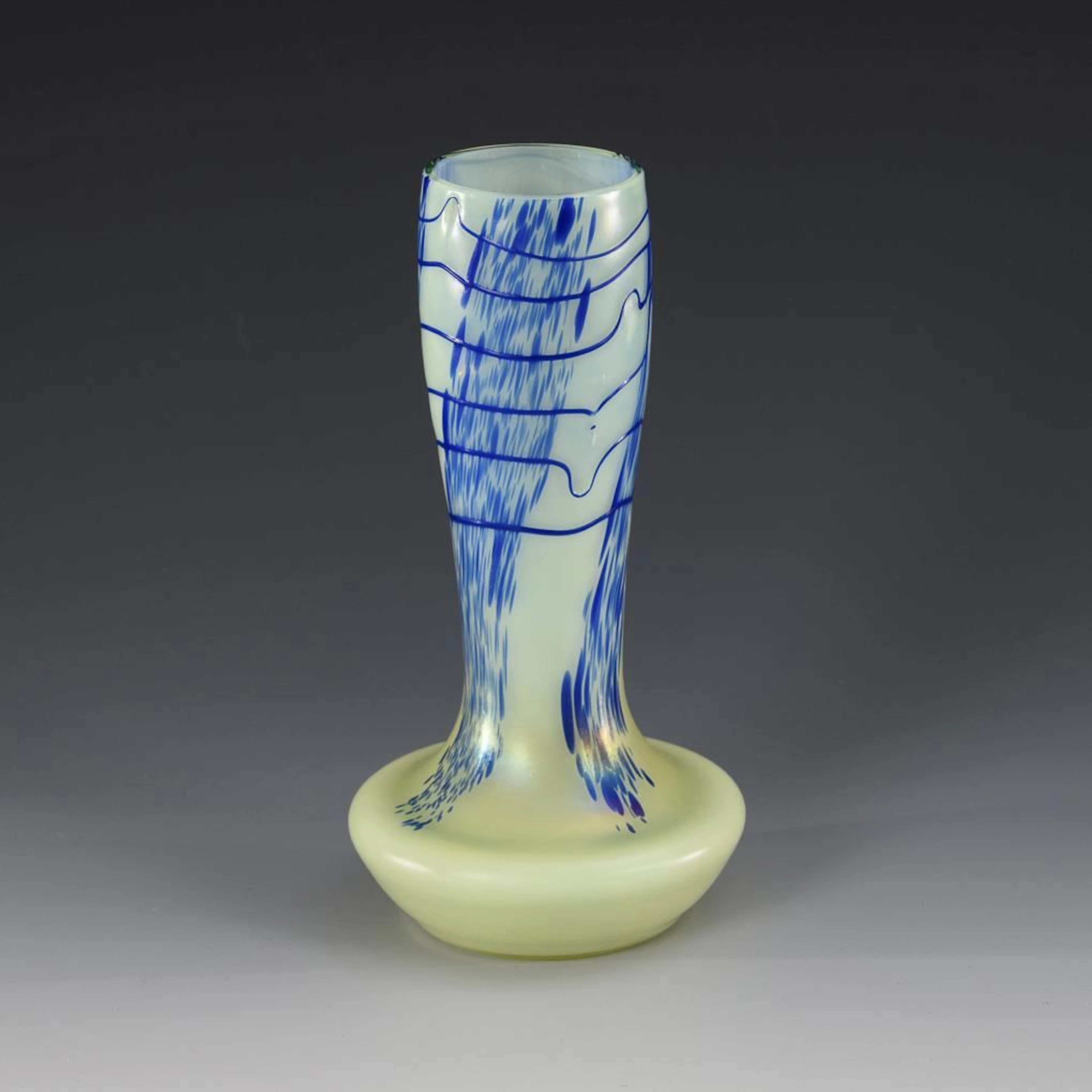 Vase with blue beads and threads. Kralik.