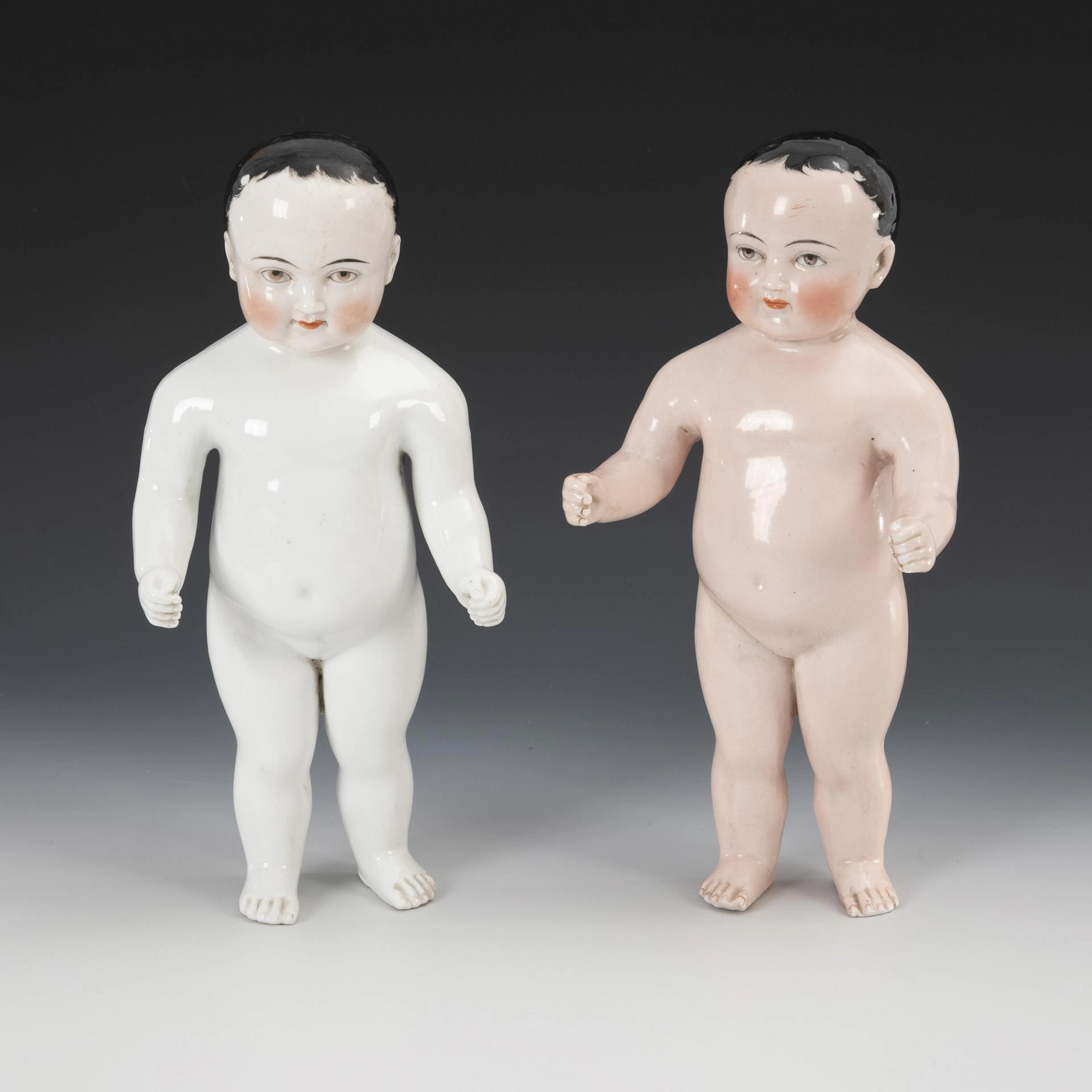 2 bathing dolls.