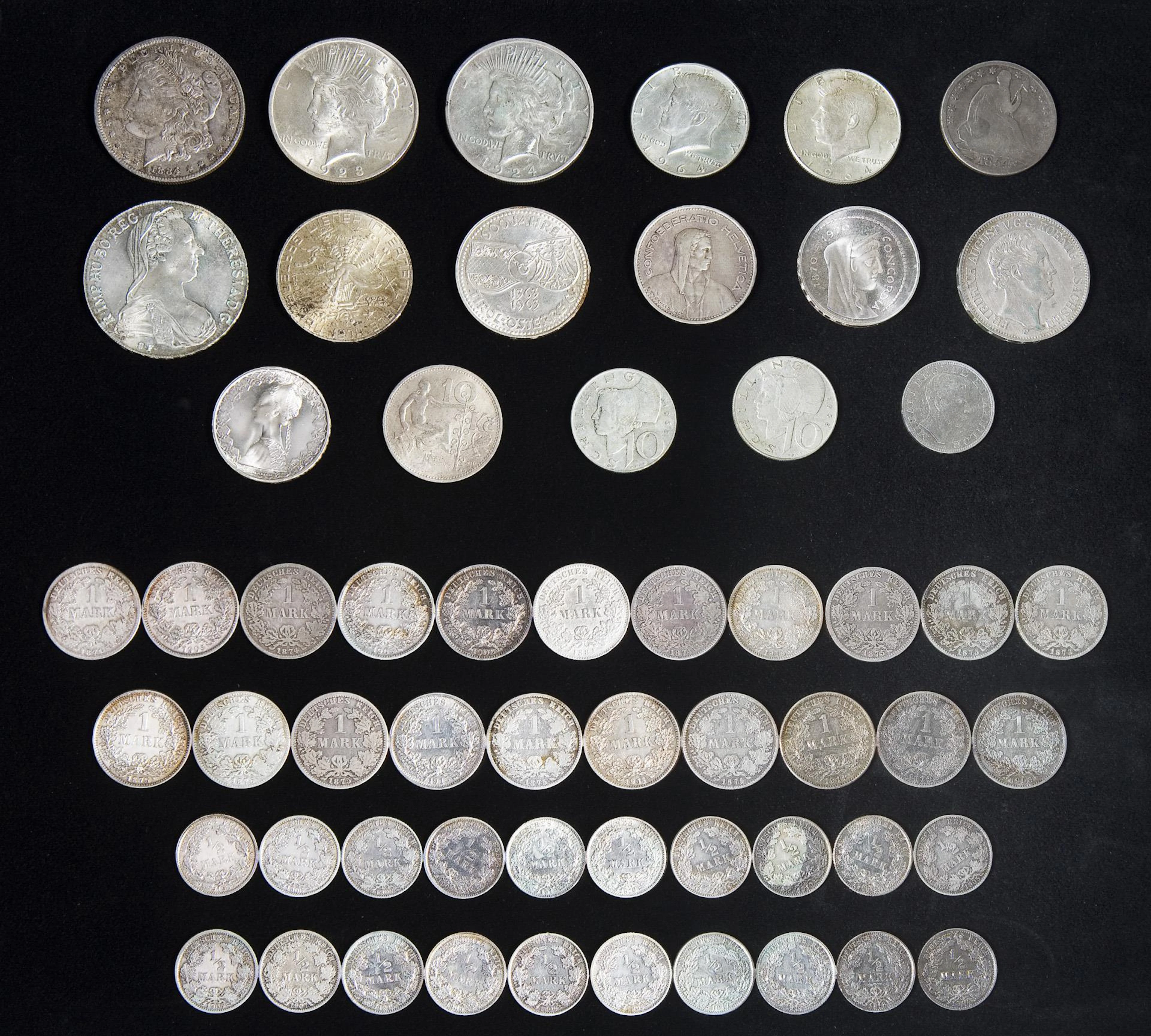 Collection of 58 silver coins.