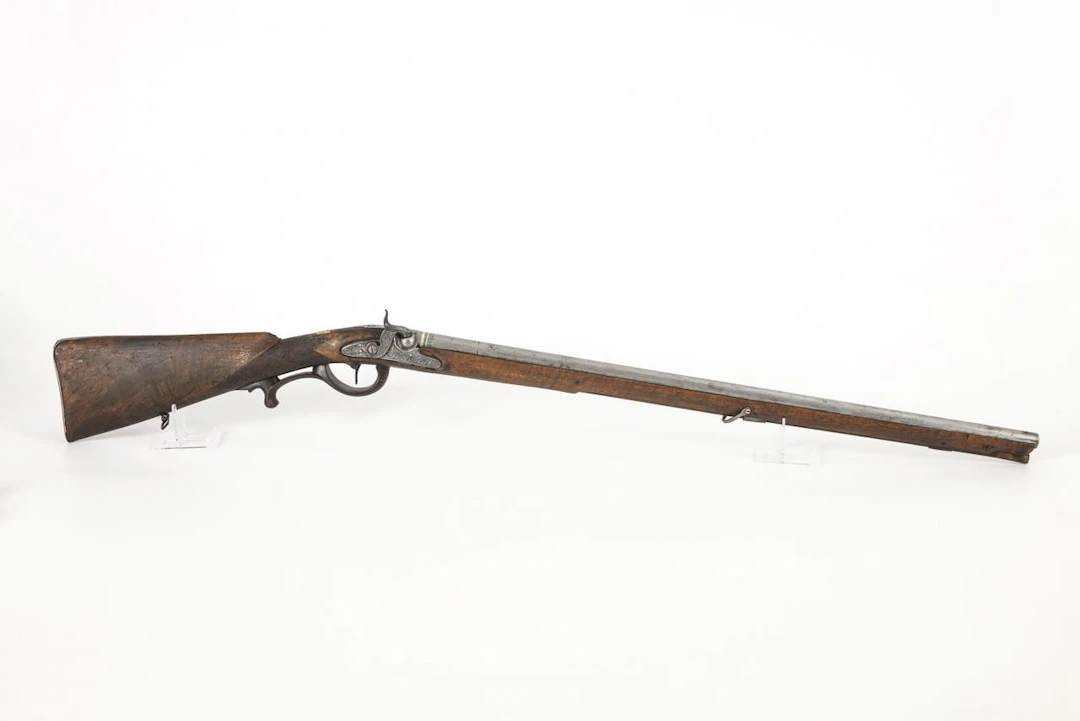 Light percussion rifle with monogram.