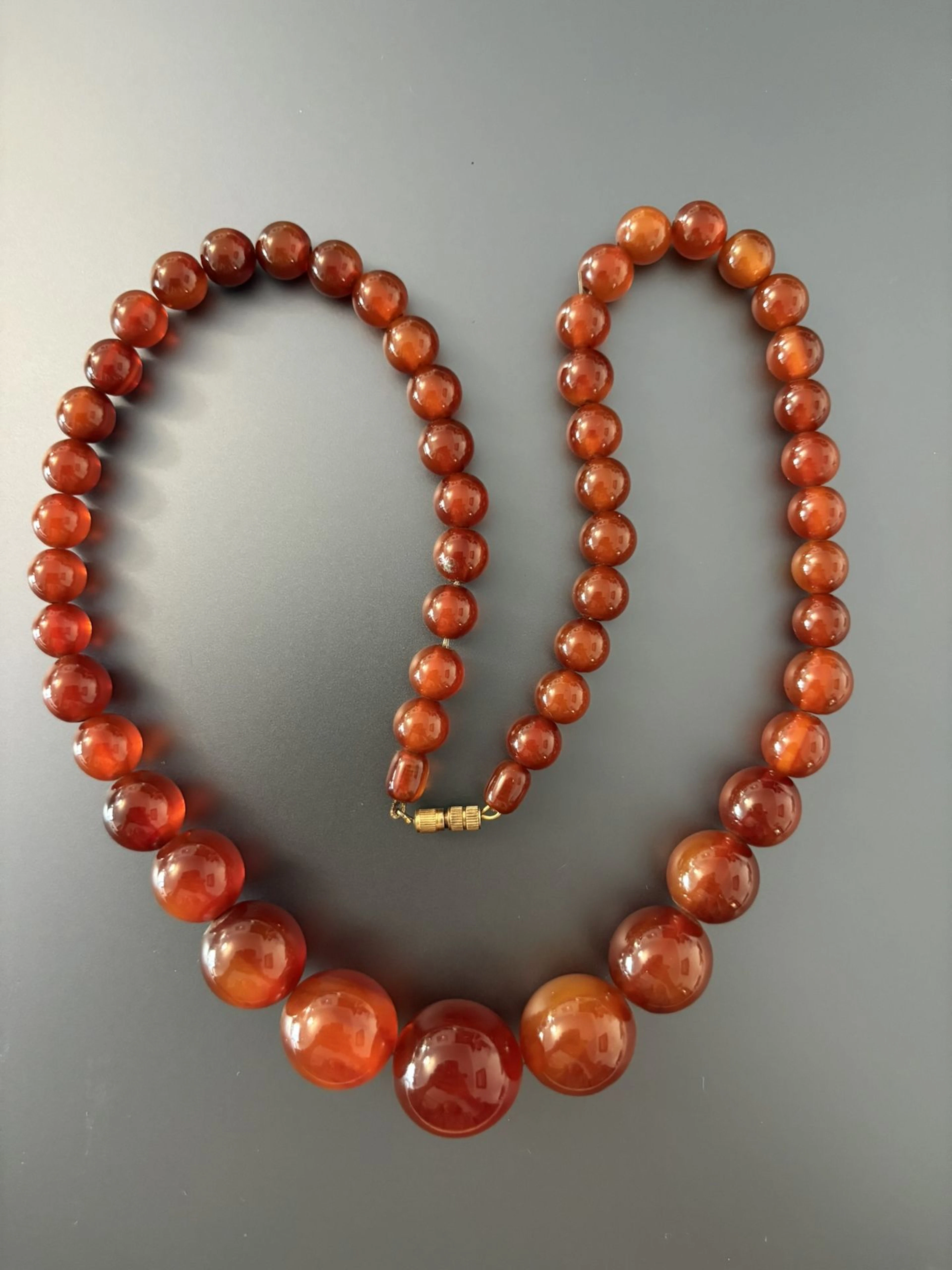 Collier ancien 53 boules couleur ambre (9 mm à 21 mm) fermoi - Lot 162
