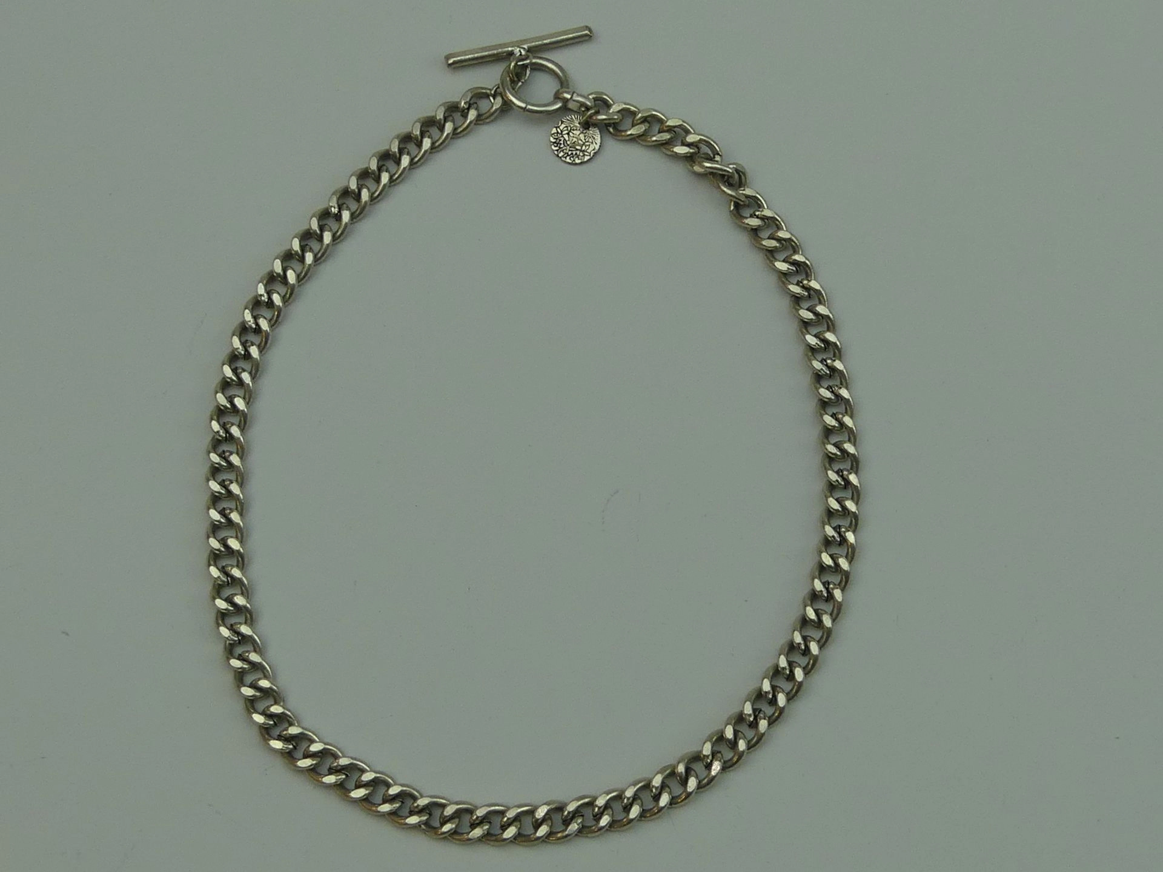 SCOOTER. Collier style chaîne de montre. Signé sur plaque. - Lot 464