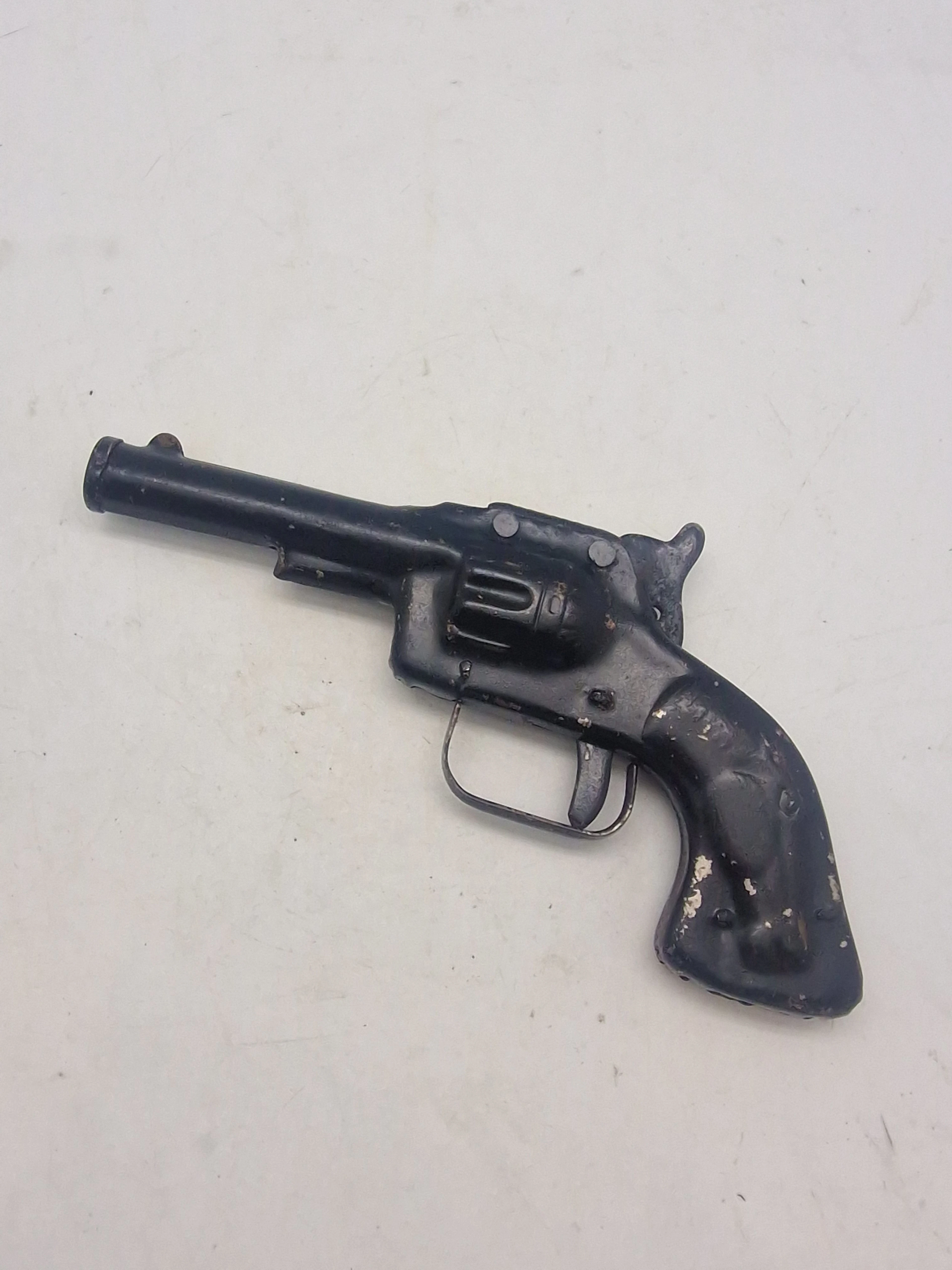 Helstøbt antik legetøjs revolver