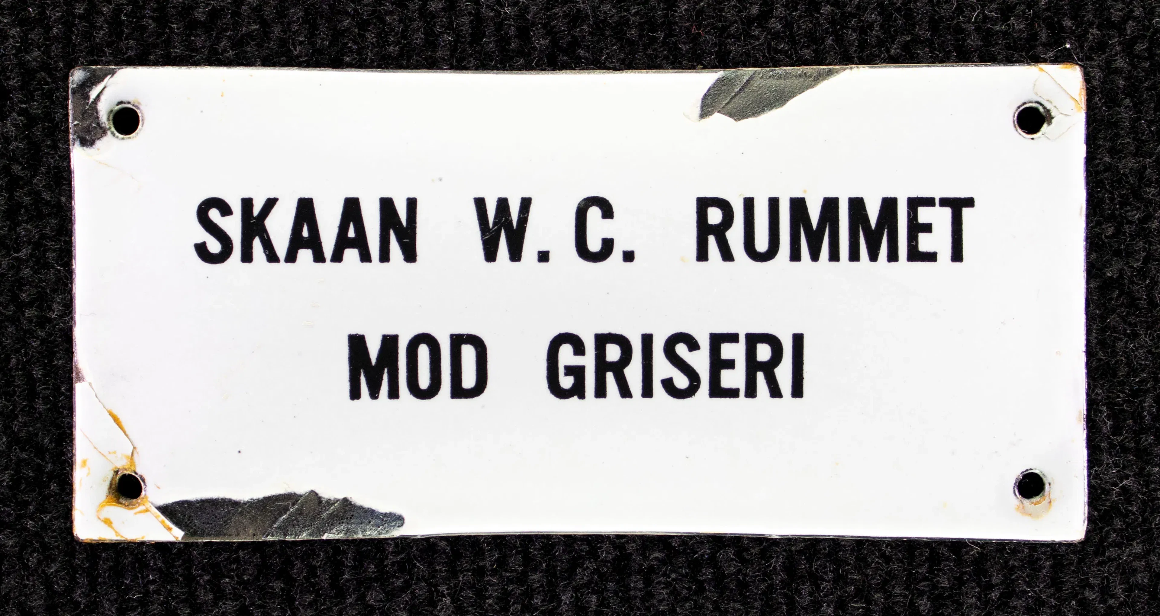 Skaan W.C. Rummet mod griseri