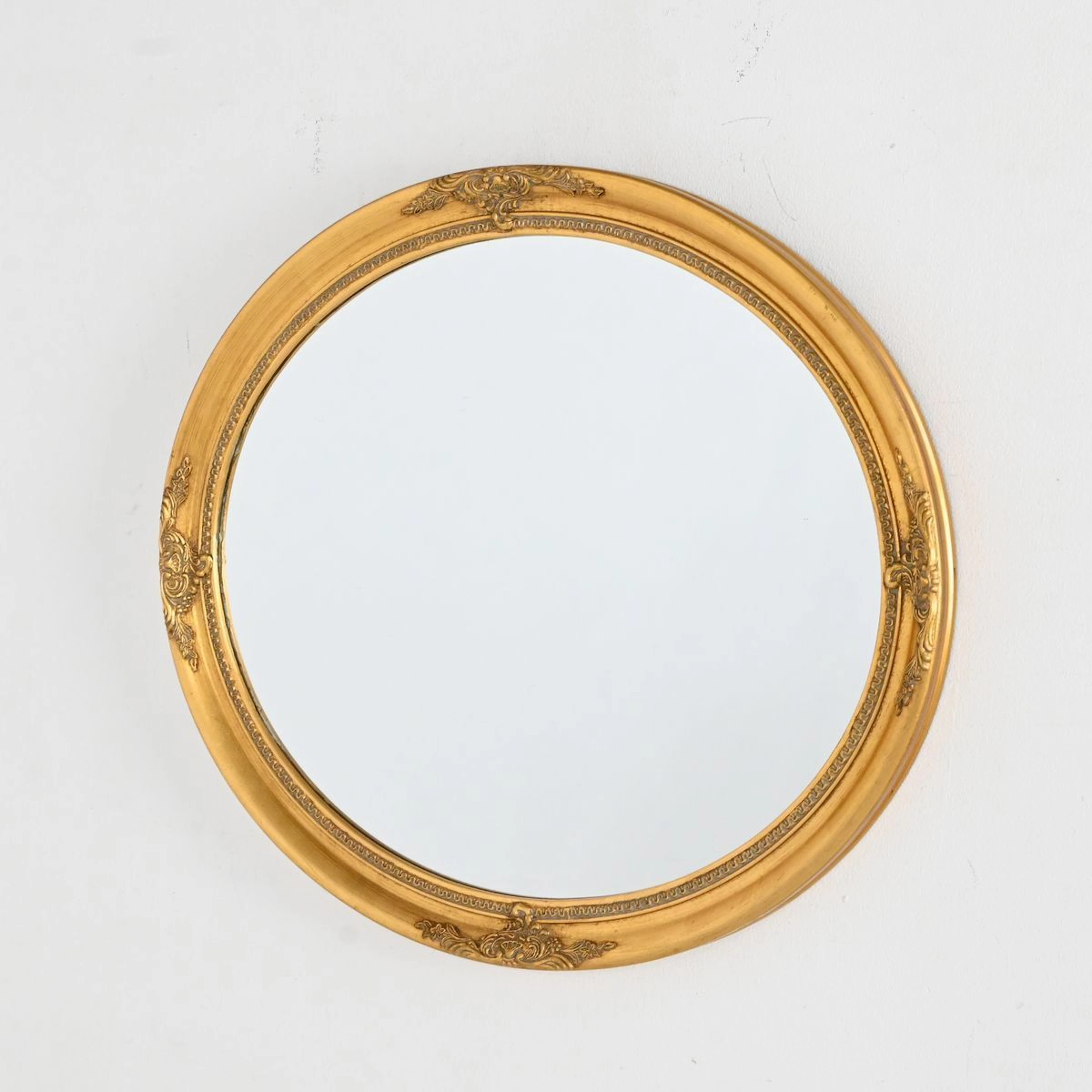 Oval spegel, guldfärgad ram