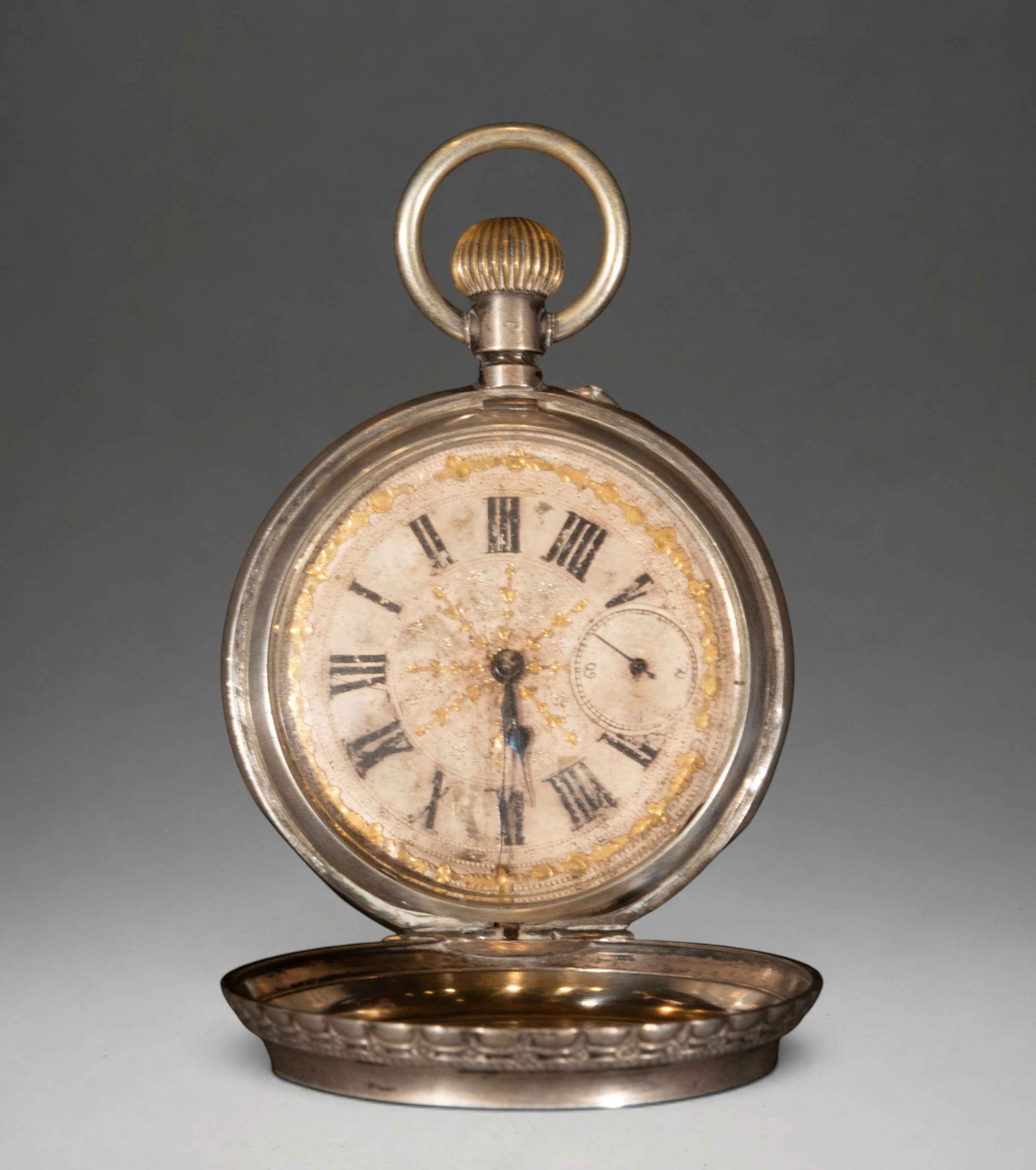 Silver-plated metal pocket watch with enamel dial and Roman numerals