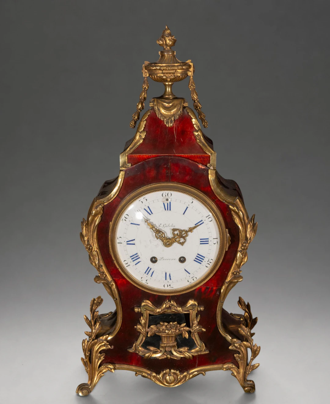 Tortoiseshell and gilt bronze mantel clock, signed “E. Gübelin, Lucerne”