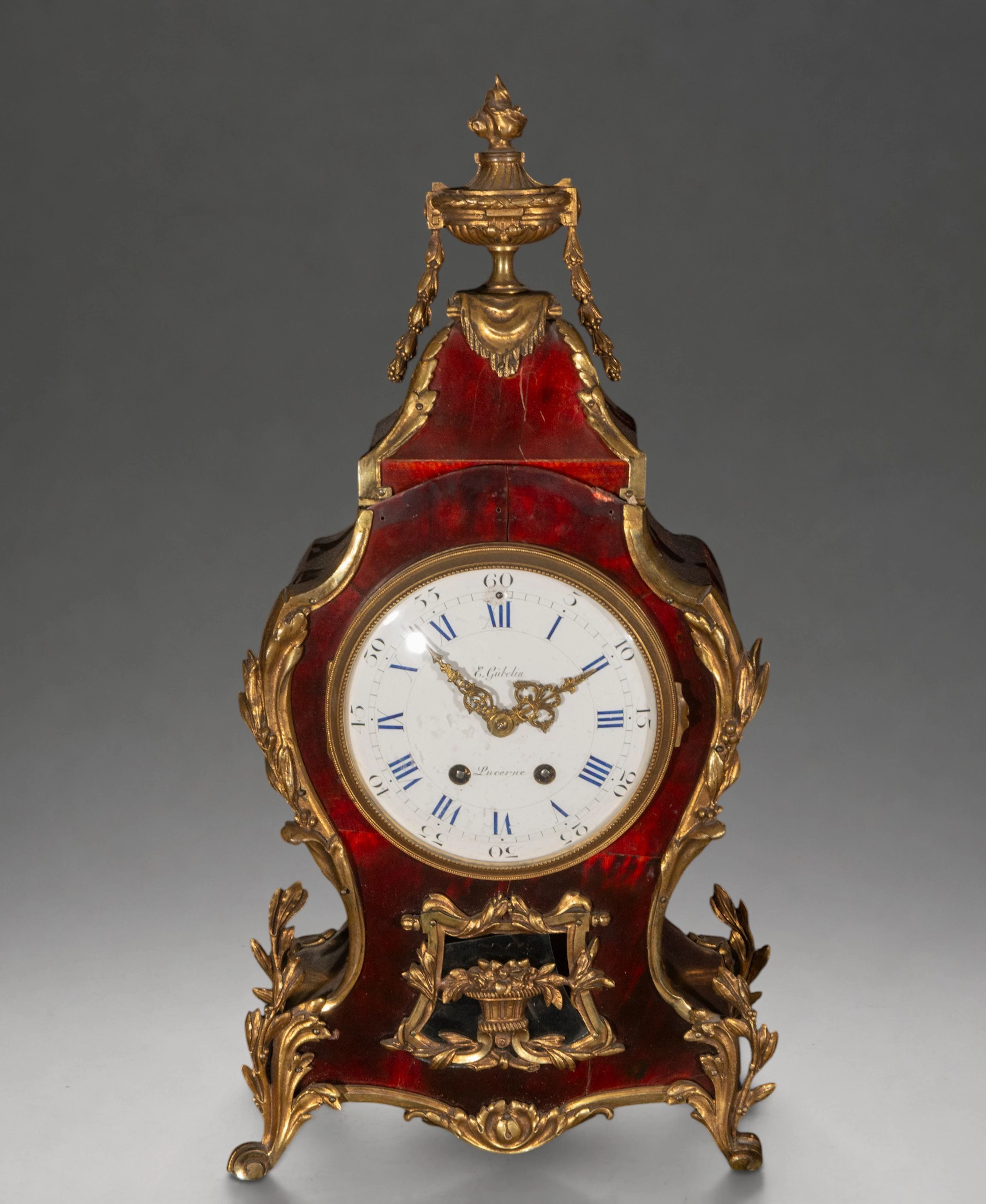 Tortoiseshell and gilt bronze mantel clock, signed “E. Gübelin, Lucerne”