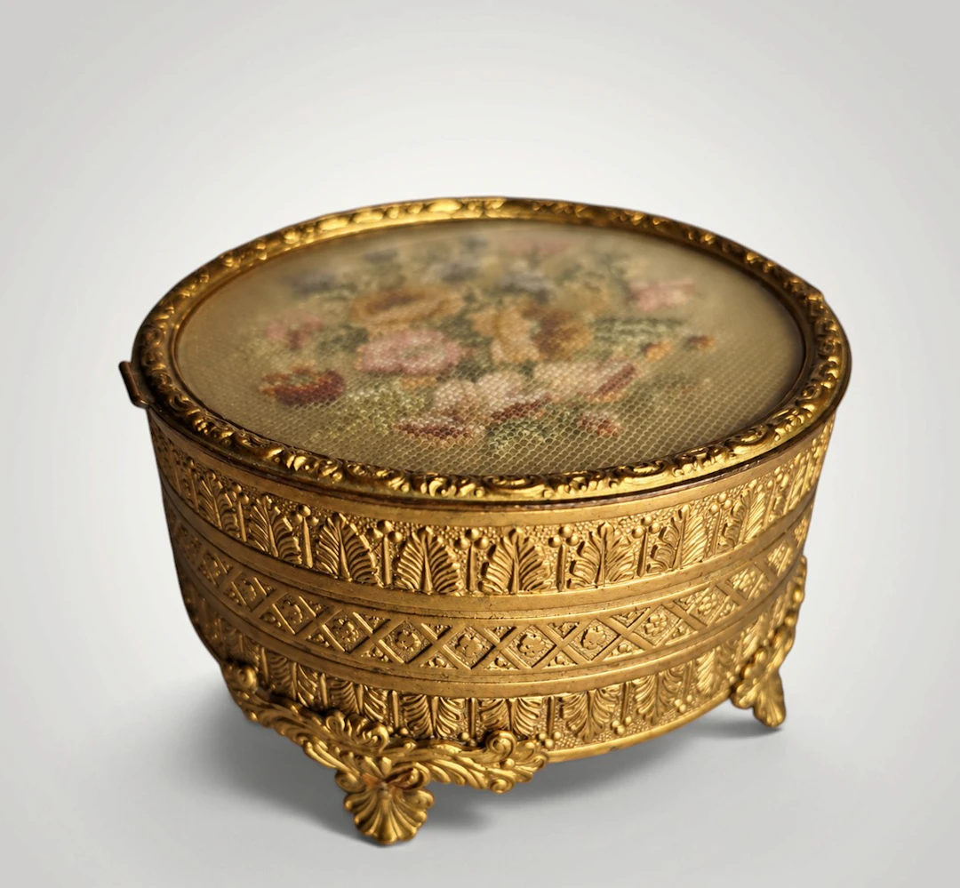 Gilt bronze jewelry box with fine embroidery on the lid. France, 1900